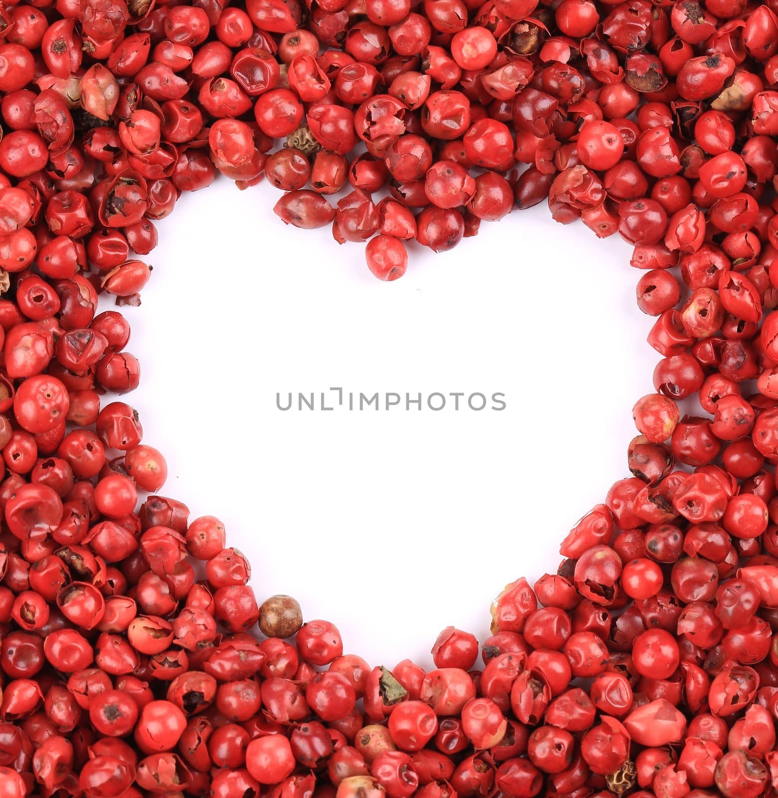 Heart in red pepper. To be used as background.