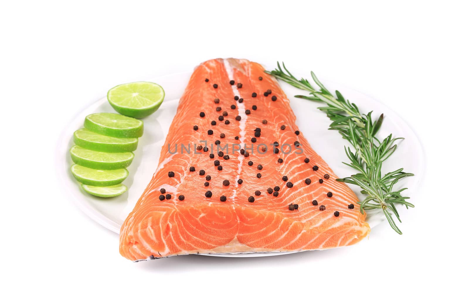 Salmon fillet with rosemary and lime. Isolated on a white background.