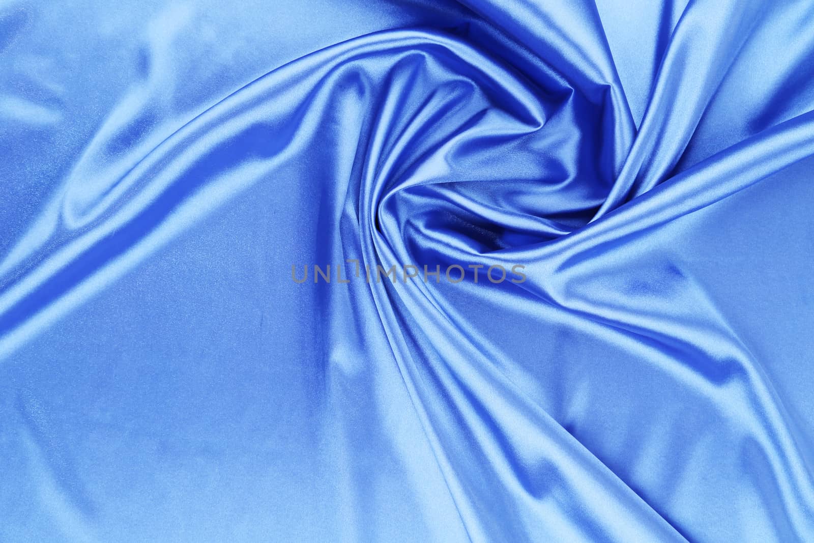 Smooth elegant blue silk. To be used as background.