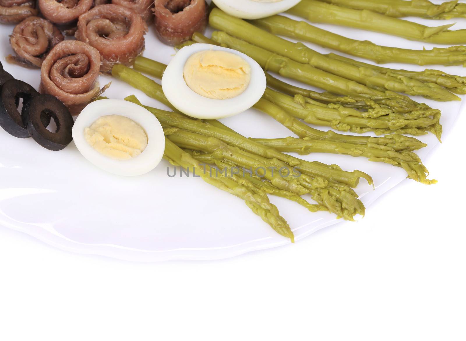 Salad with anchovies and asparagus. To be used as background.
