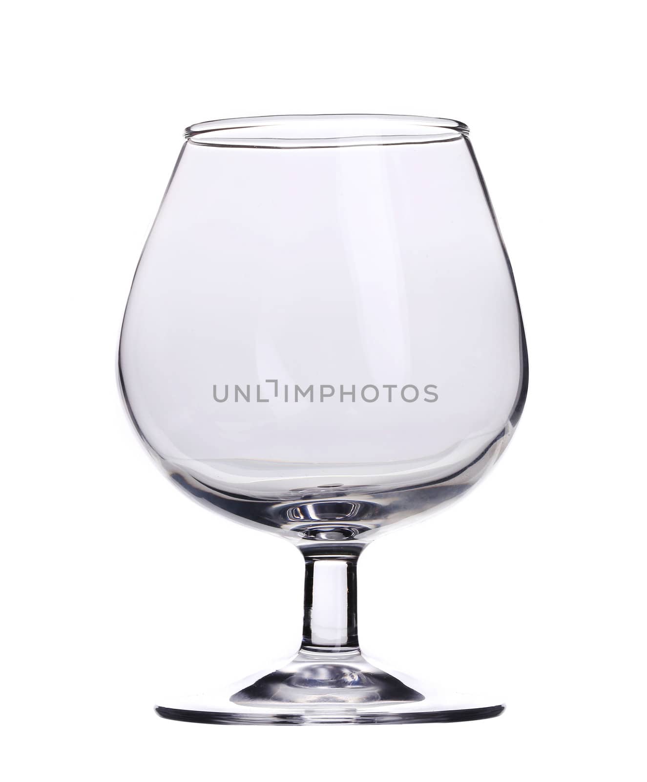 Single empty brandy glass. Isolated on a white background