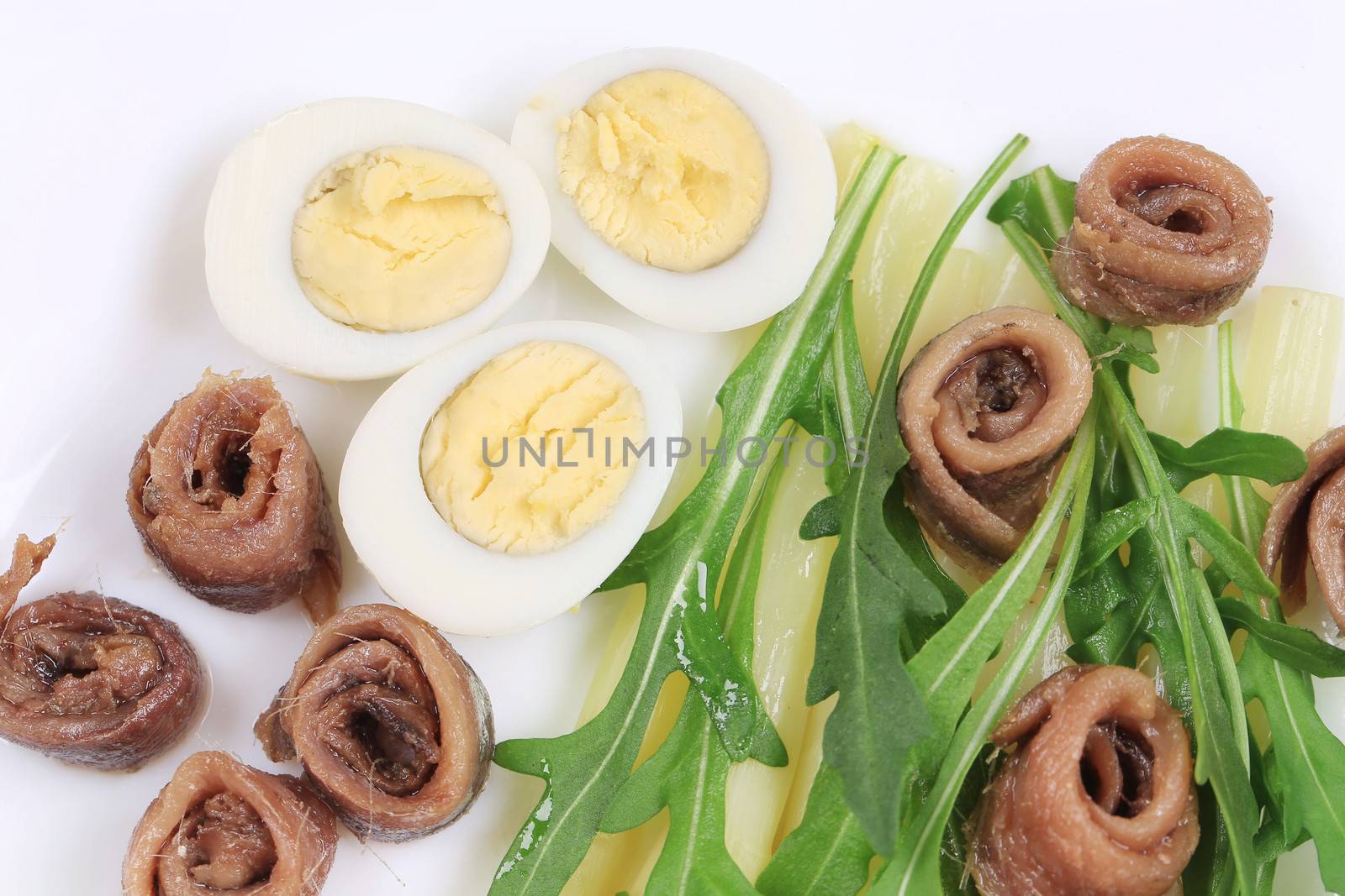 Salad with anchovies and asparagus. To be used as background.