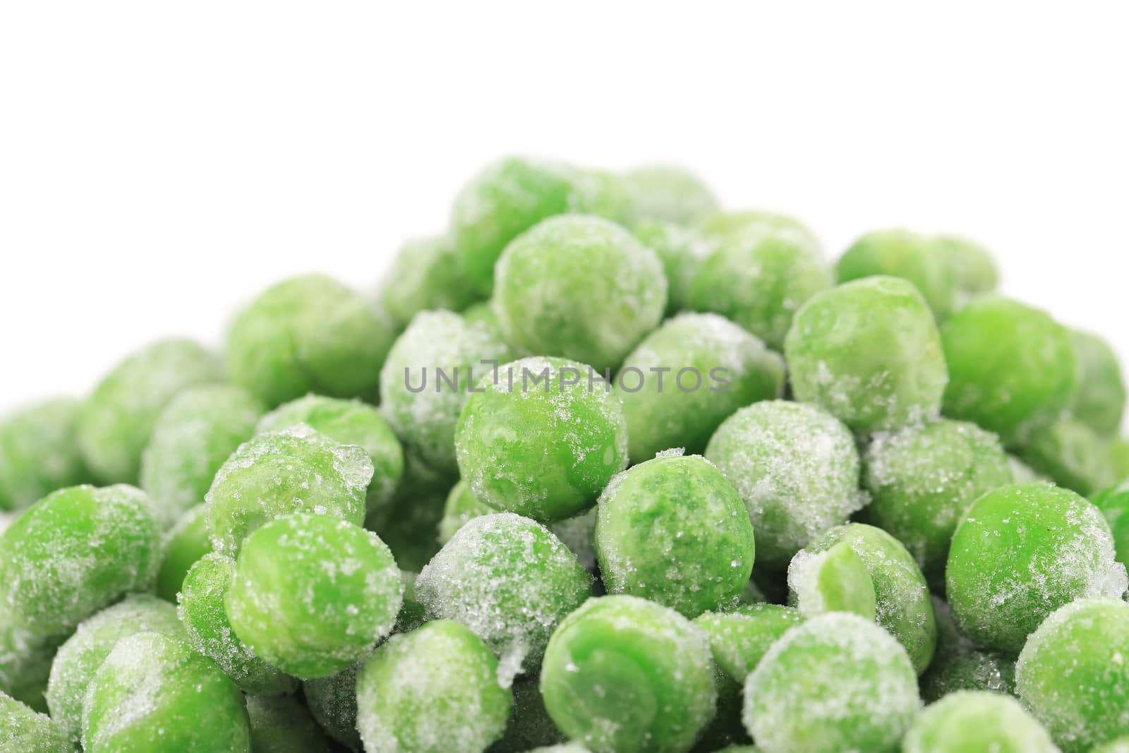 Close up of frozen green peas. Whole background.