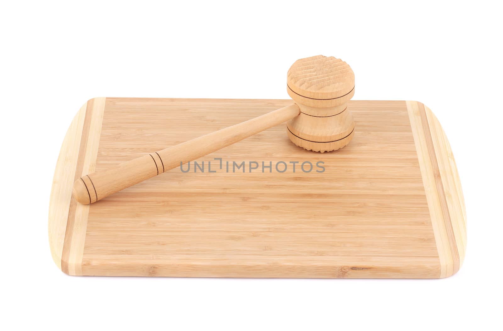 Wooden meat hammer on kitchen board. Isolated on white background.