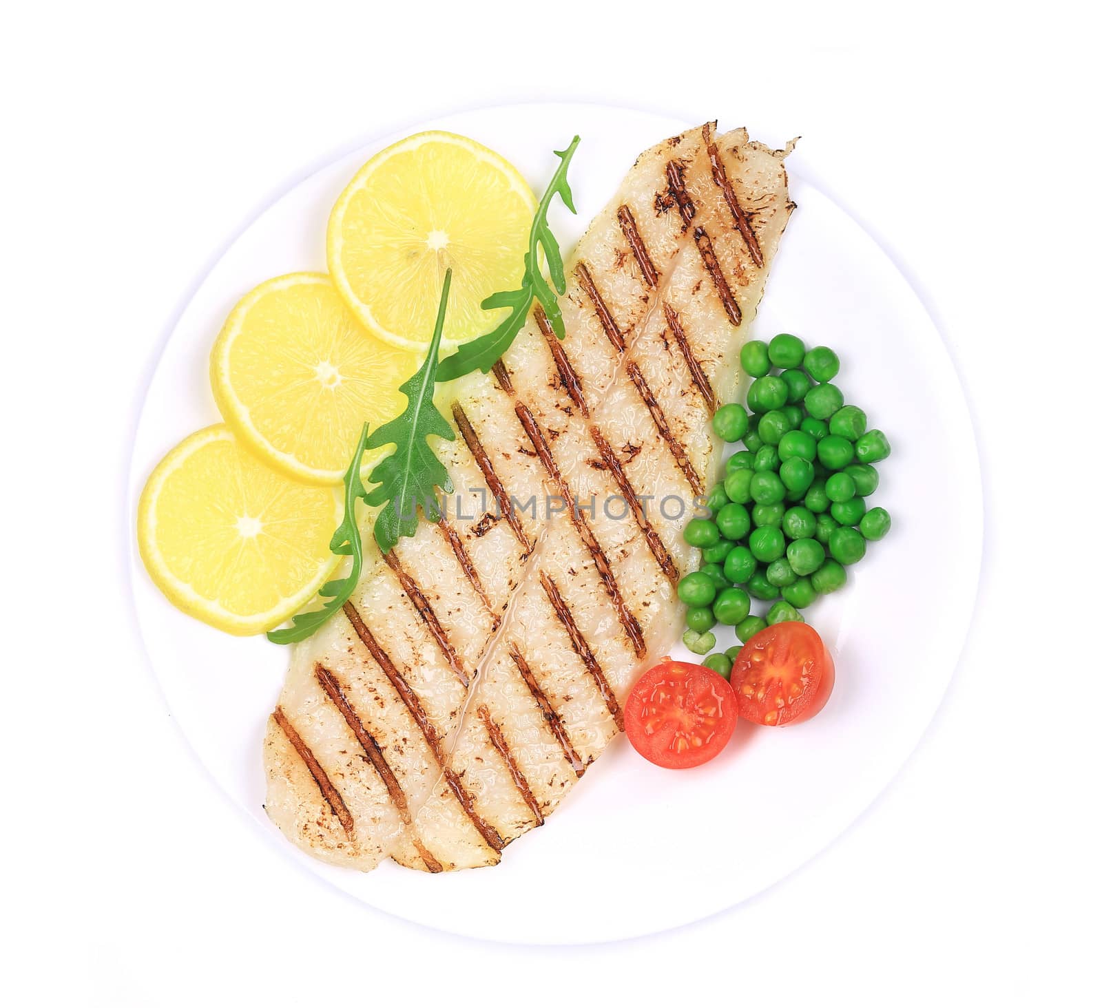 Pangasius fillet on plate. Isolated on a white background.