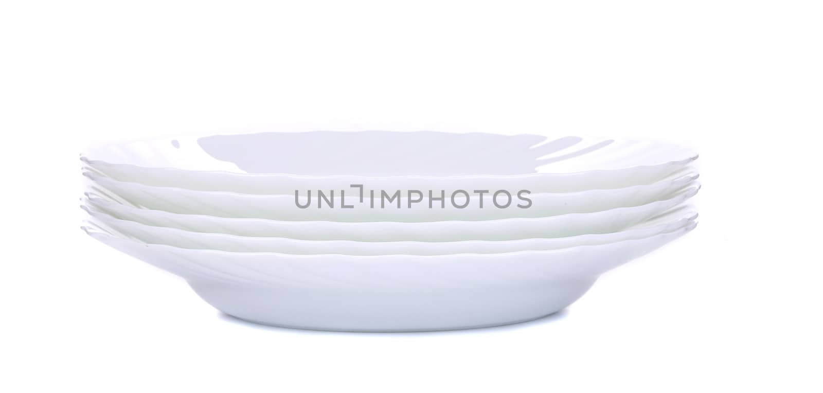 Empty plate isolated on a white. Isolated on a white background.