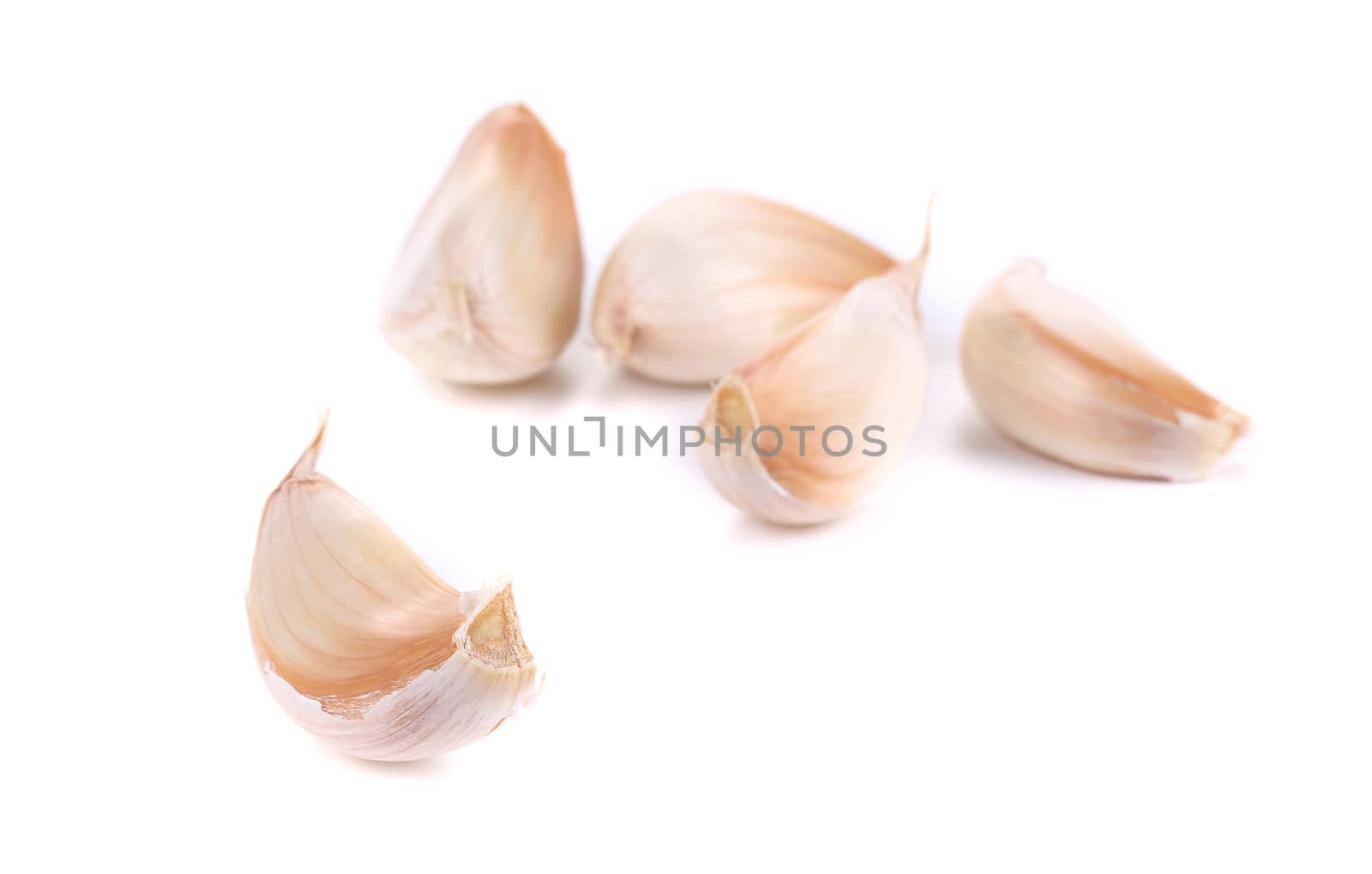 Close up of garlic cloves. Isolated on a white background.
