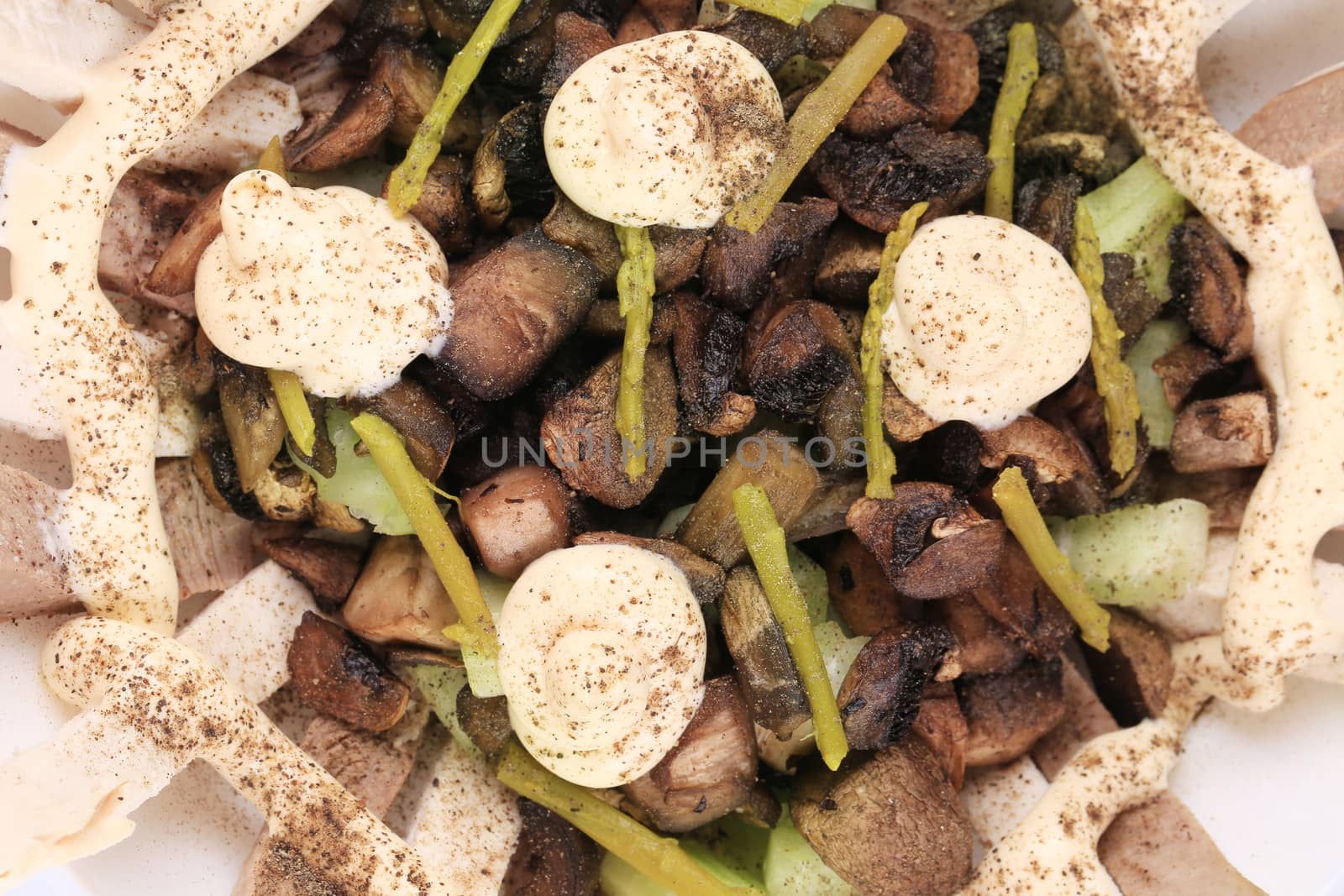 Meat salad with mushrooms. Close up. Whole background.