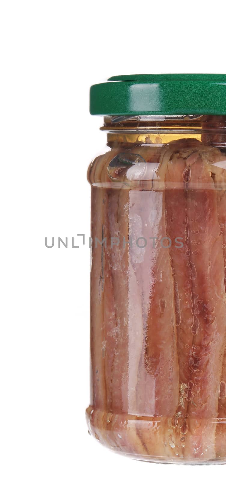 Jar of anchovy fillets. Close up. Whole background. Place for text.