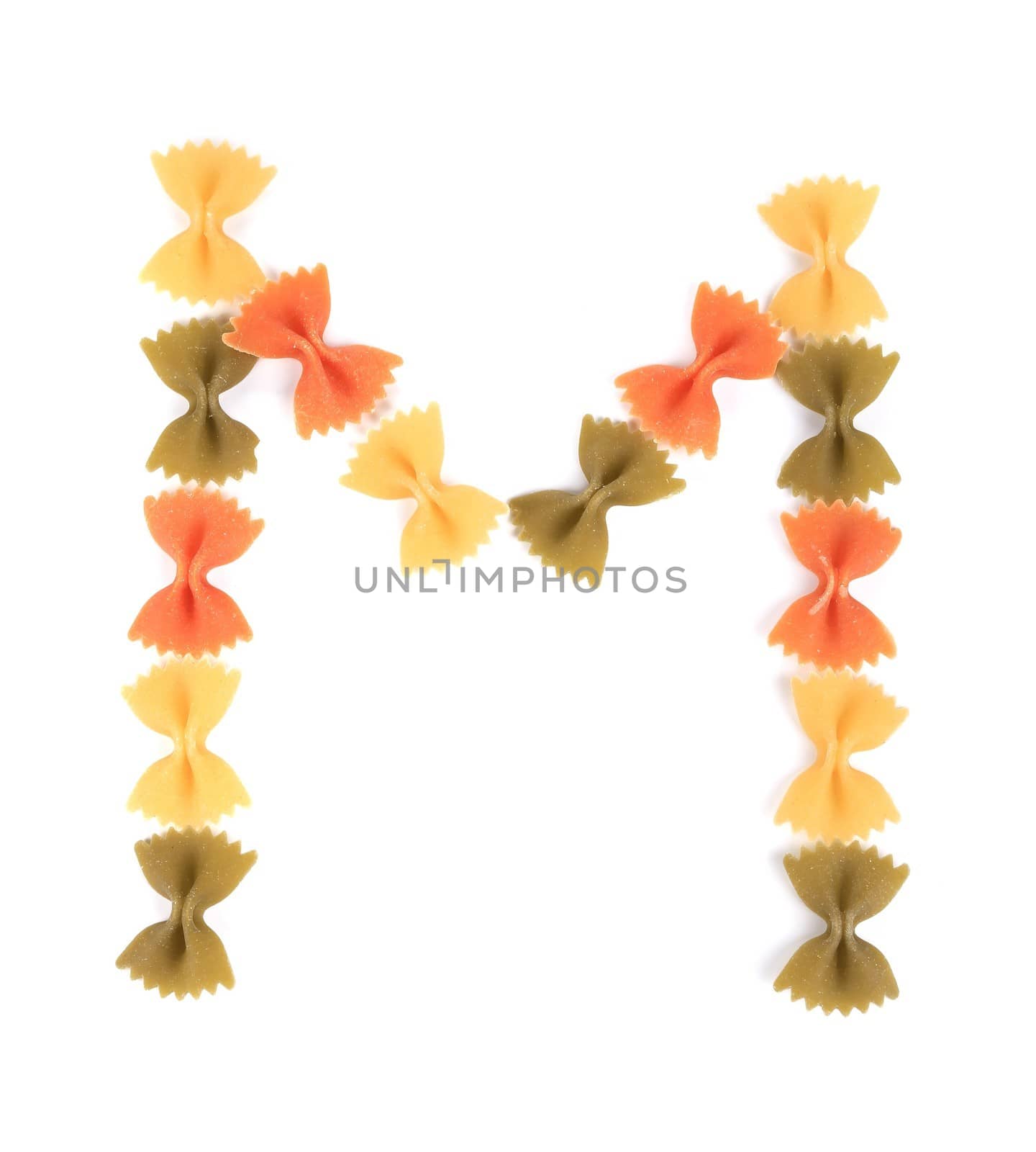 Letter M from the colorful pasta. Isolated on a white background.