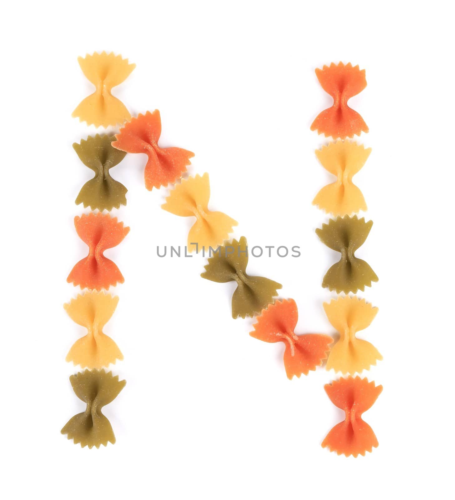 Letter N from the colorful pasta. Isolated on a white background.
