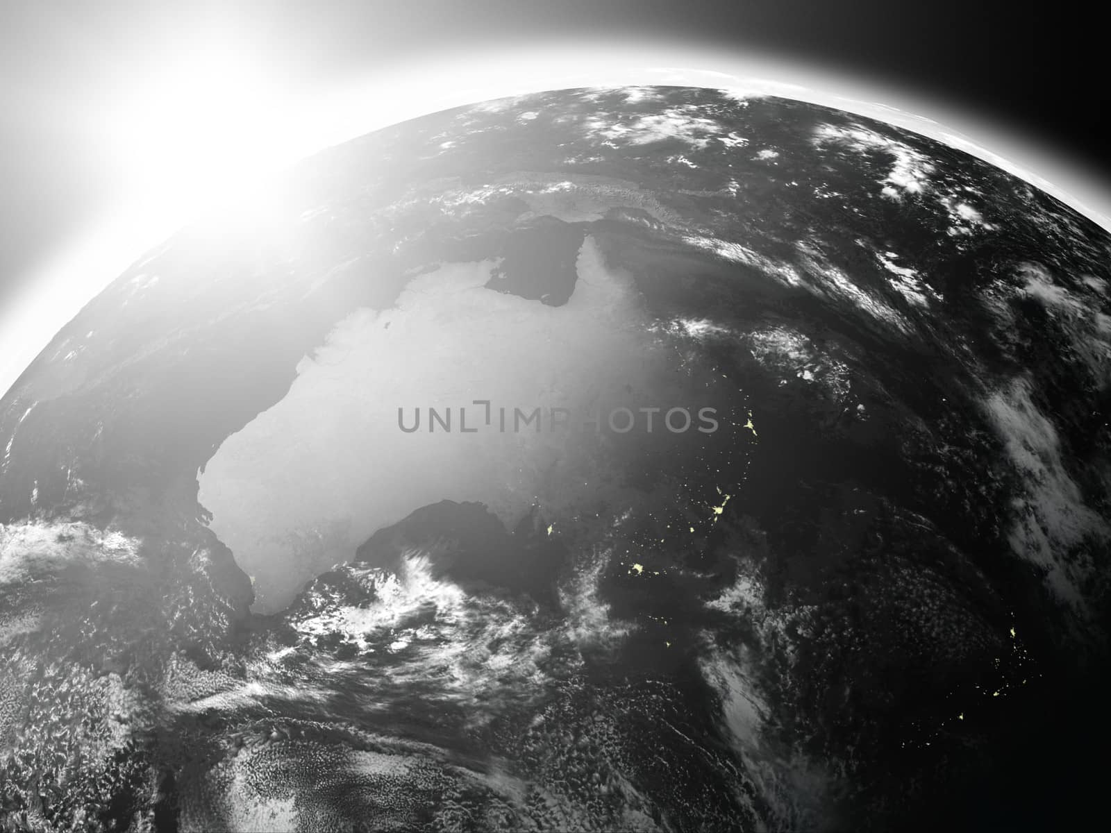 Space view of the sun rising over Australia on black planet Earth. Elements of this image furnished by NASA.