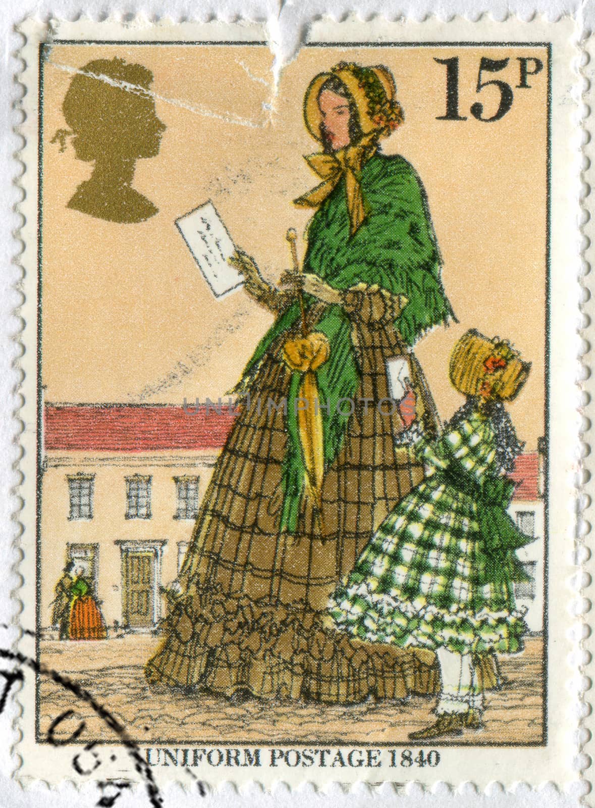 GREAT BRITAIN - CIRCA 1979: stamp printed by Great Britain, shows Victorian woman and child mailing letter, circa 1979