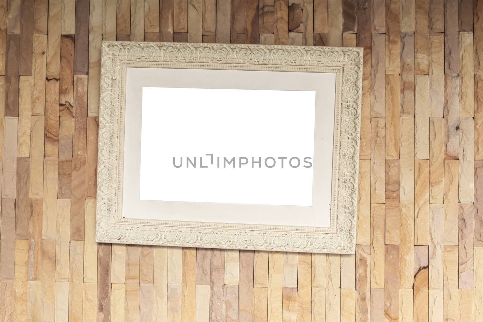 picture frame on brick wall