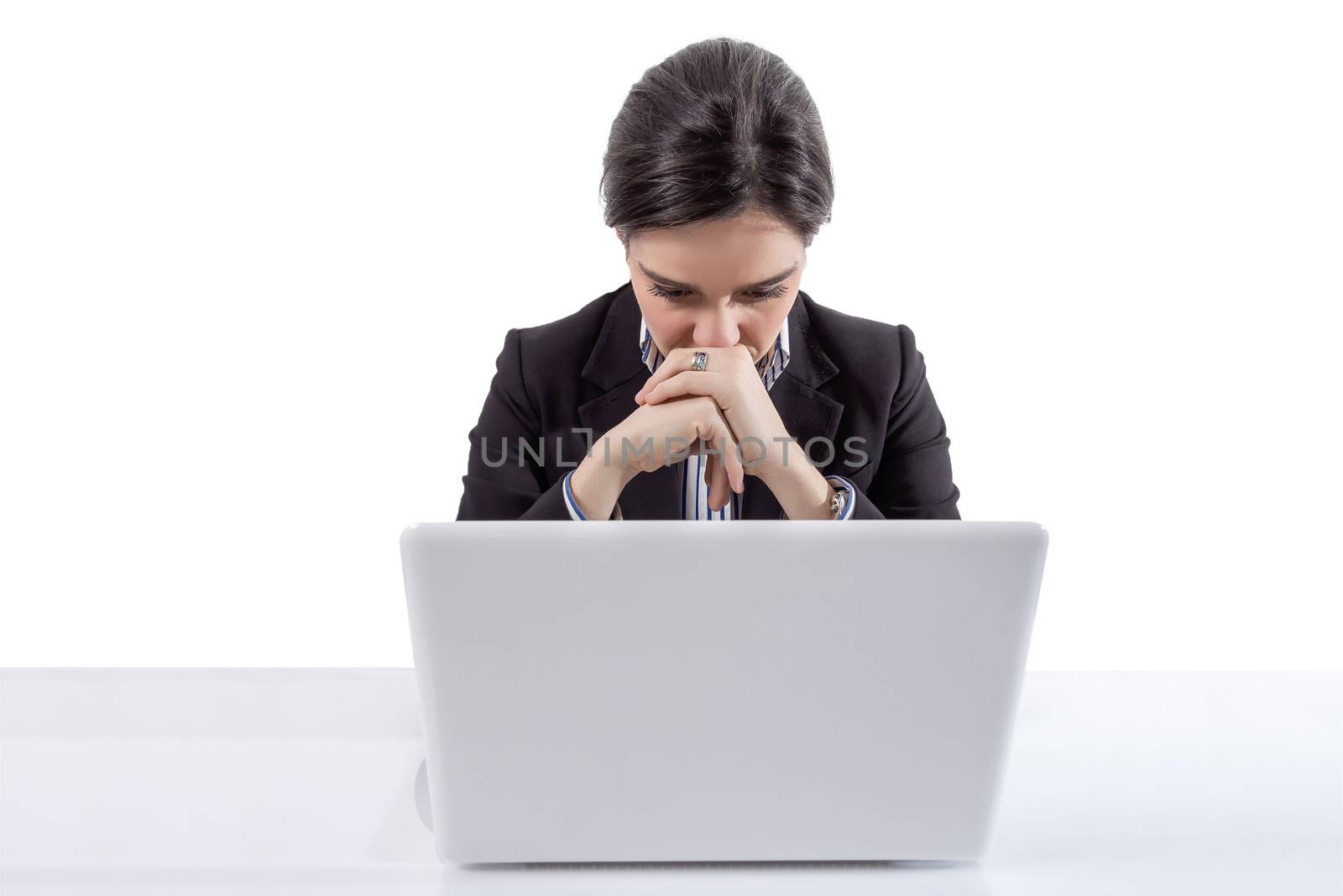 Portrait of stressed and tired young business woman with a laptop computer on white background