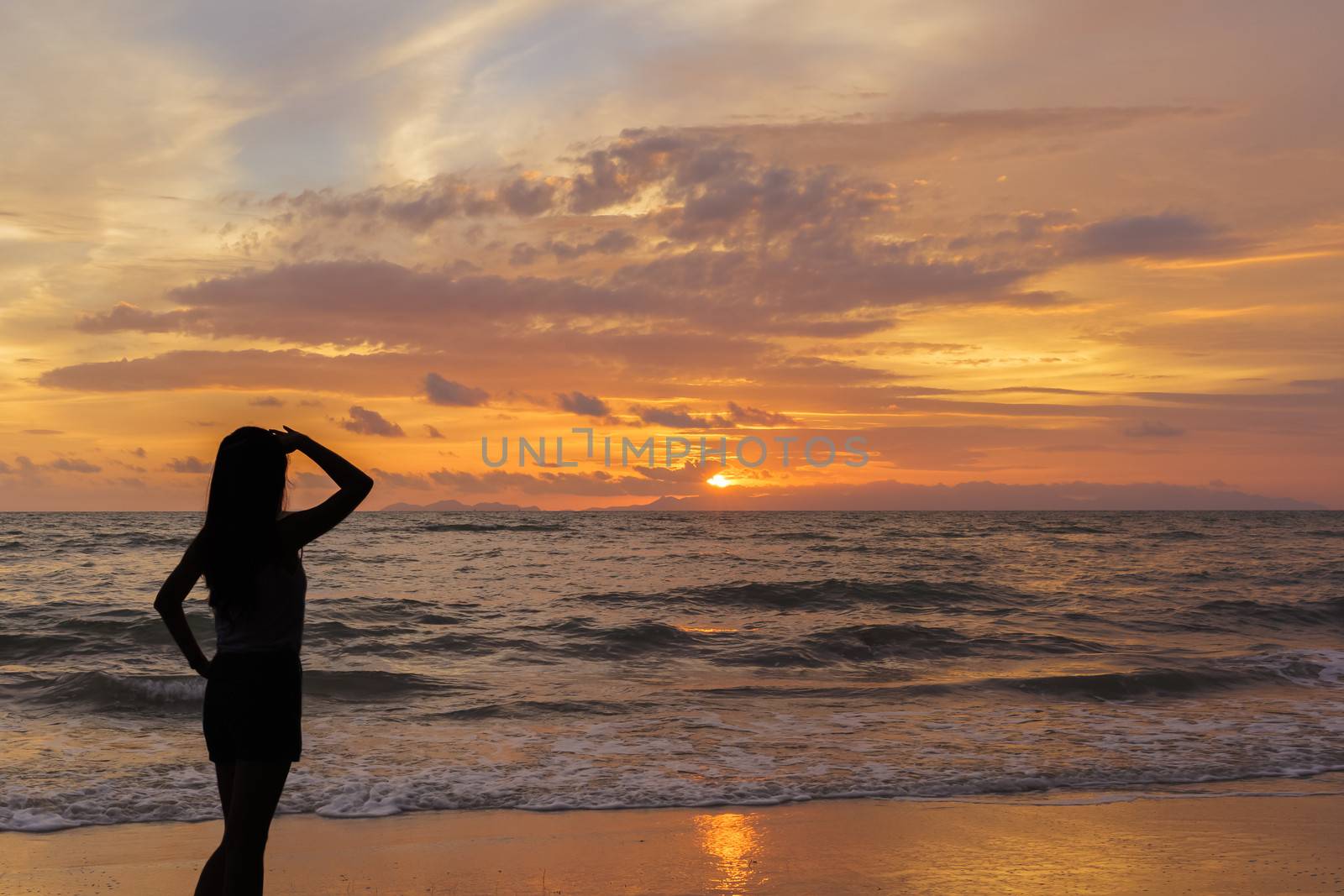 woman looking in the sunset