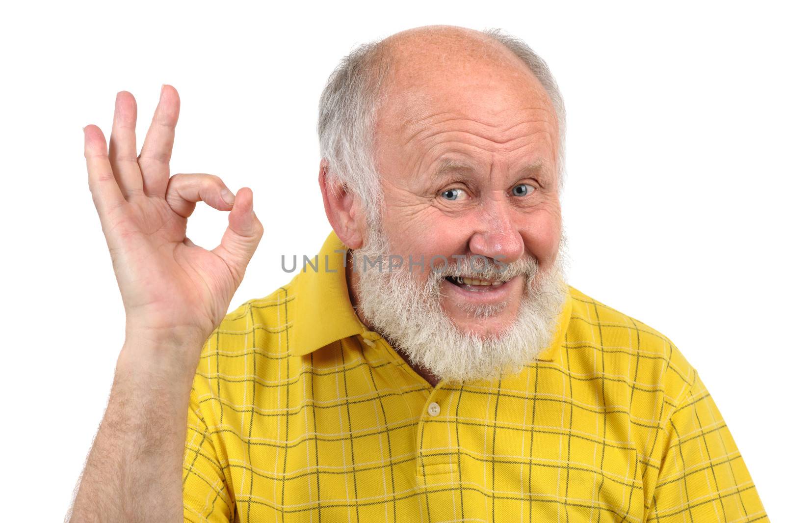 senior funny bald man in yellow t-shirt is shows gestures and grimaces