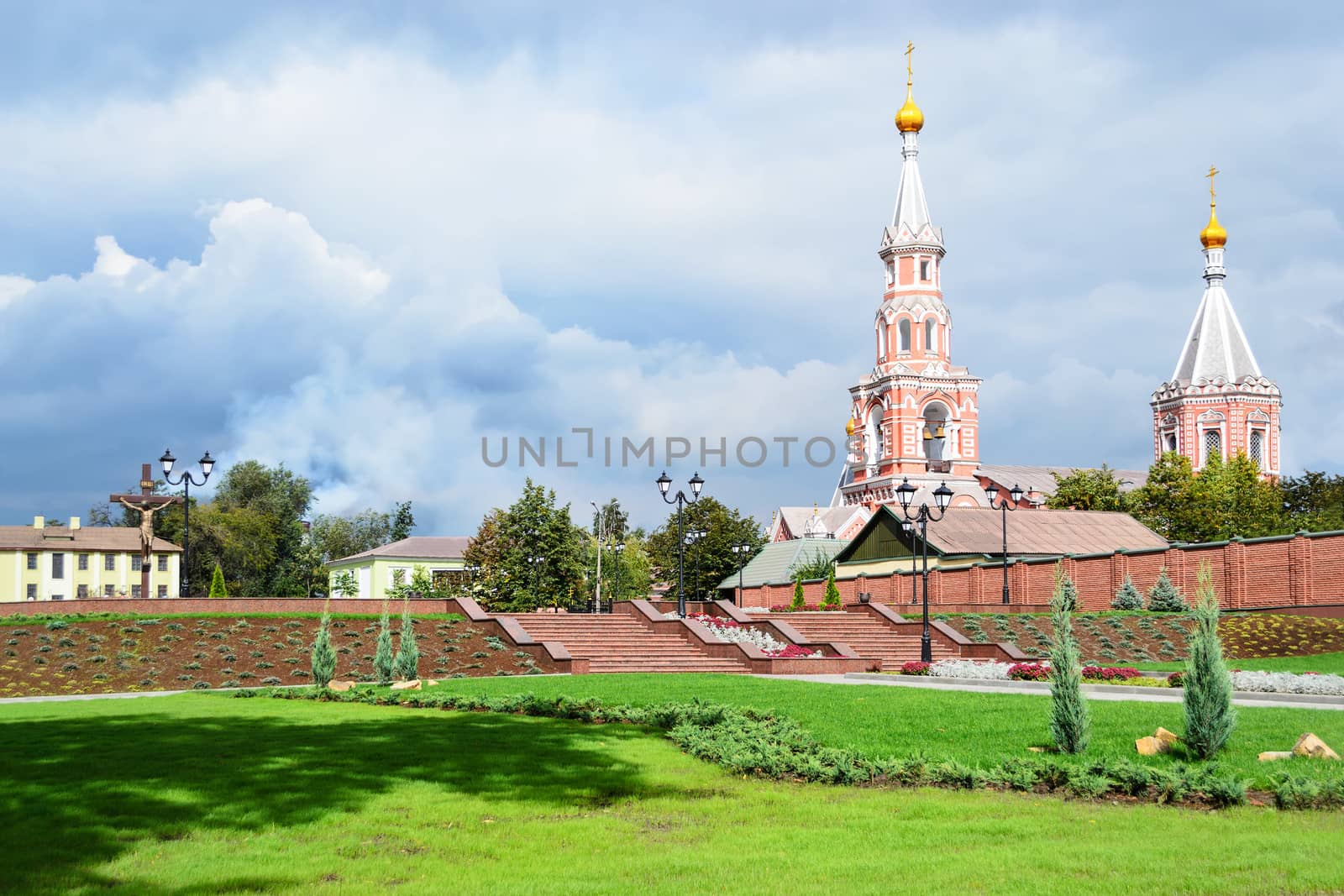 Christian church against the sky with dark clouds. Dniprodzerzhyns'k, Ukraine.