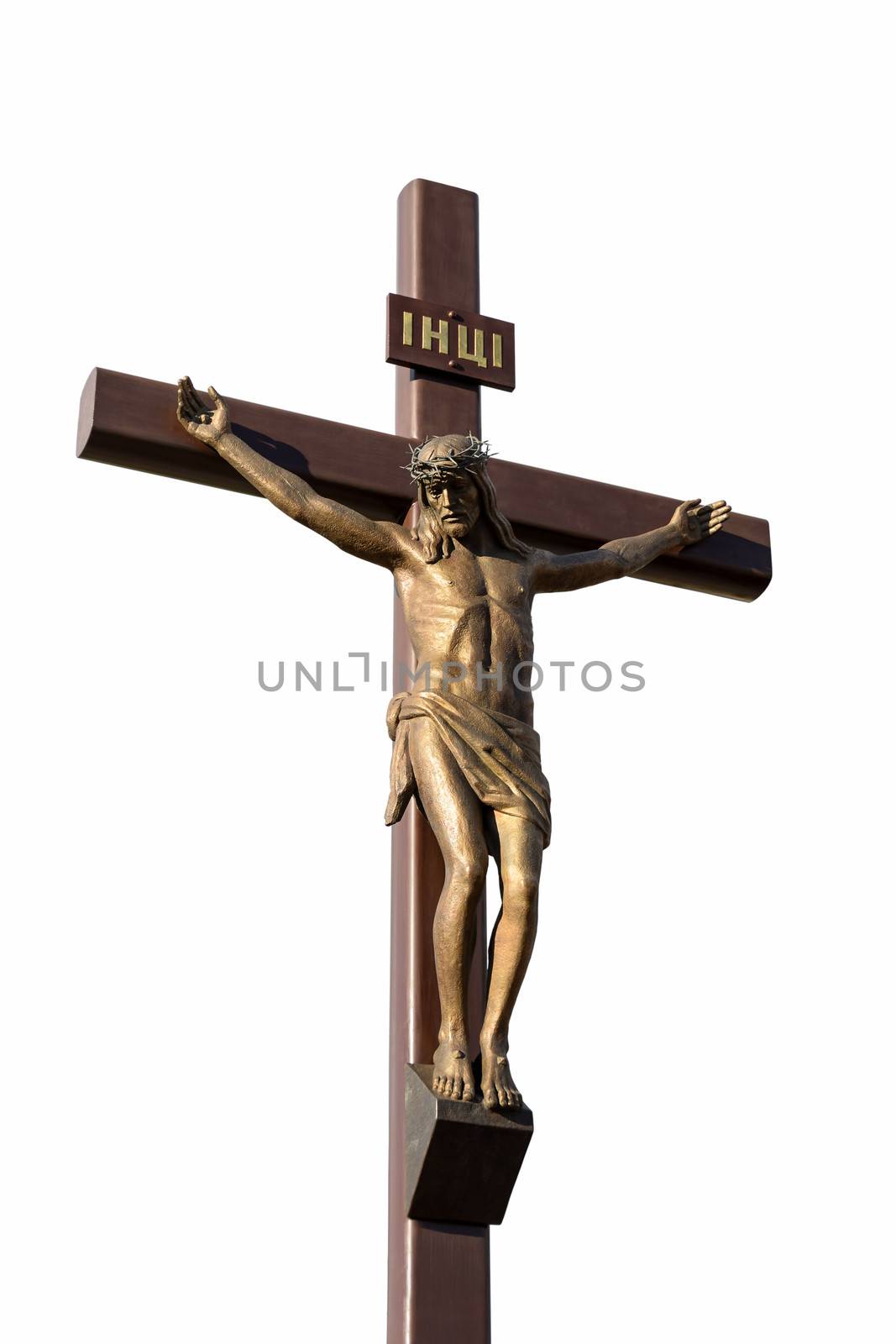 Statue of the crucifixion. Isolated on white background.
