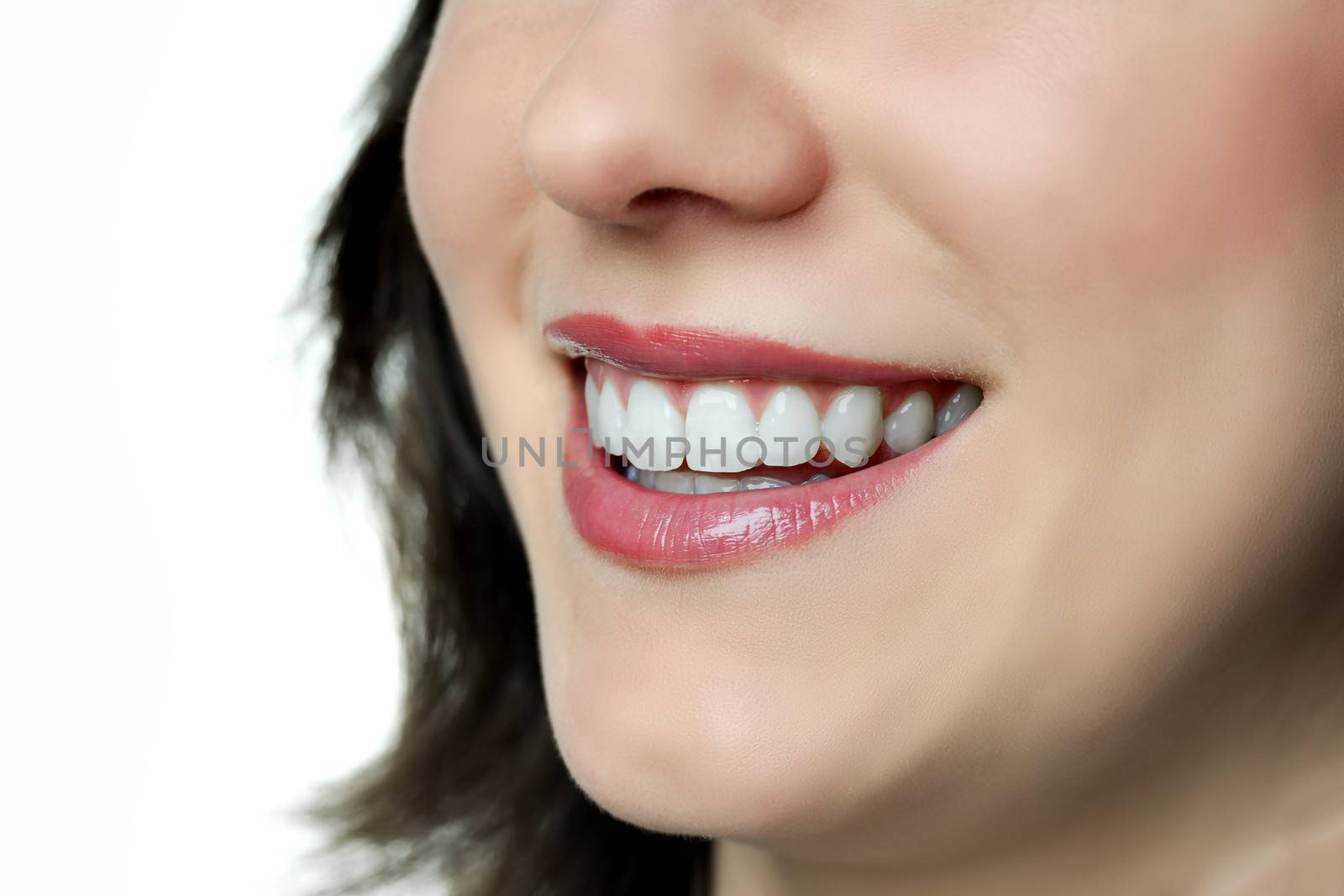 Clouseup of smiling woman with lips, teeth, mouth and nose
