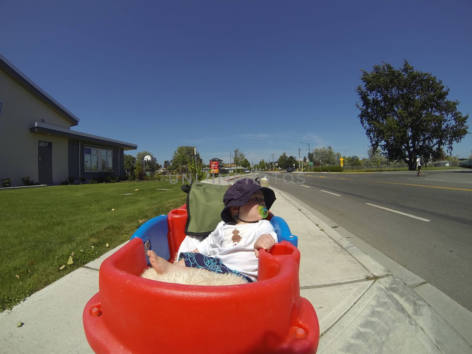 baby chilling in wagon