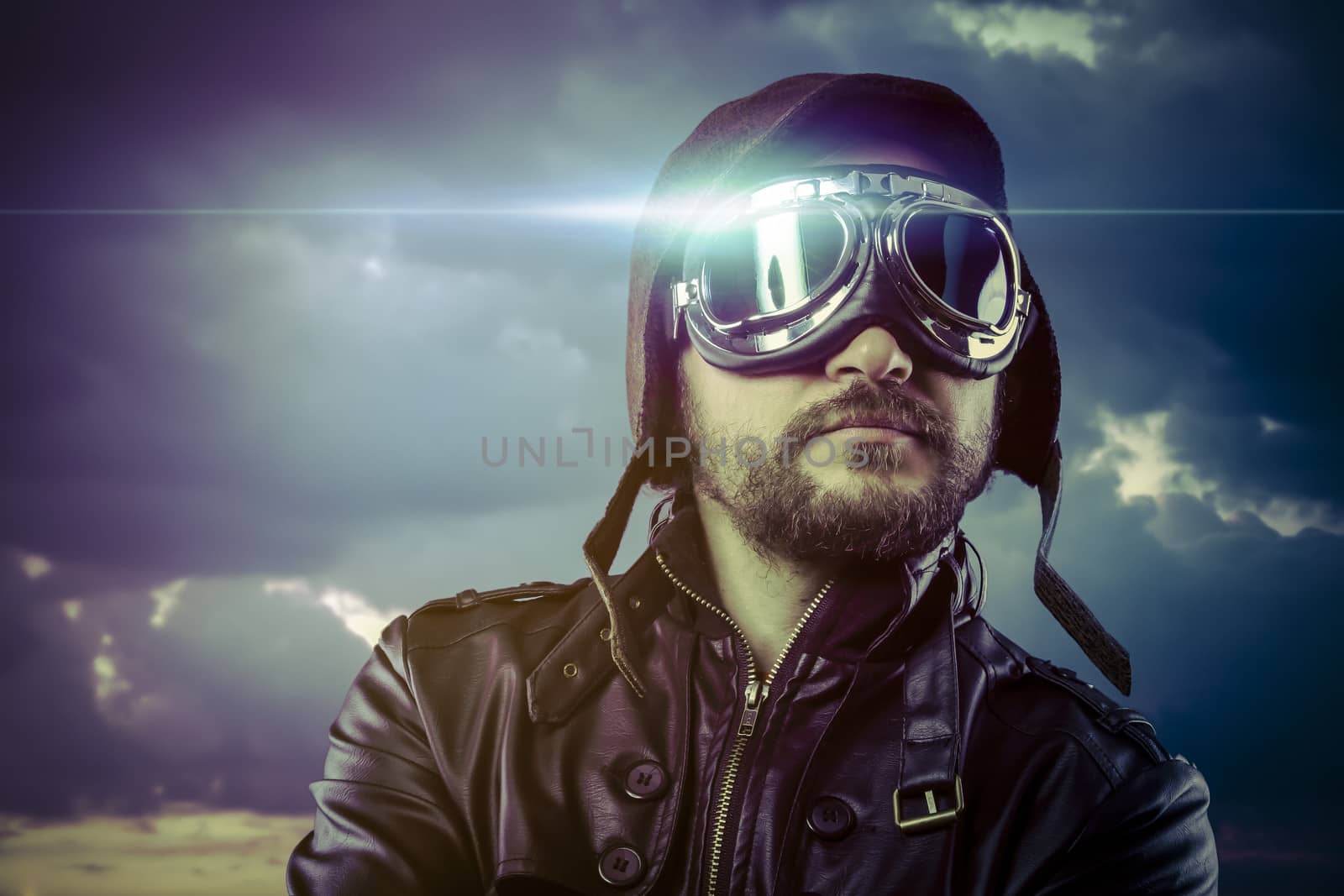 Flight, man dressed as pilot in helmet on clouds background. Vin by FernandoCortes