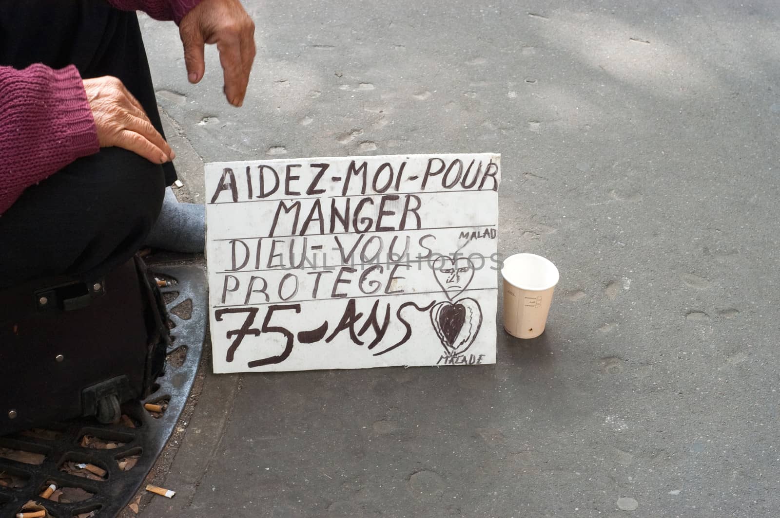 Beggar in Tronchet street, Paris. France