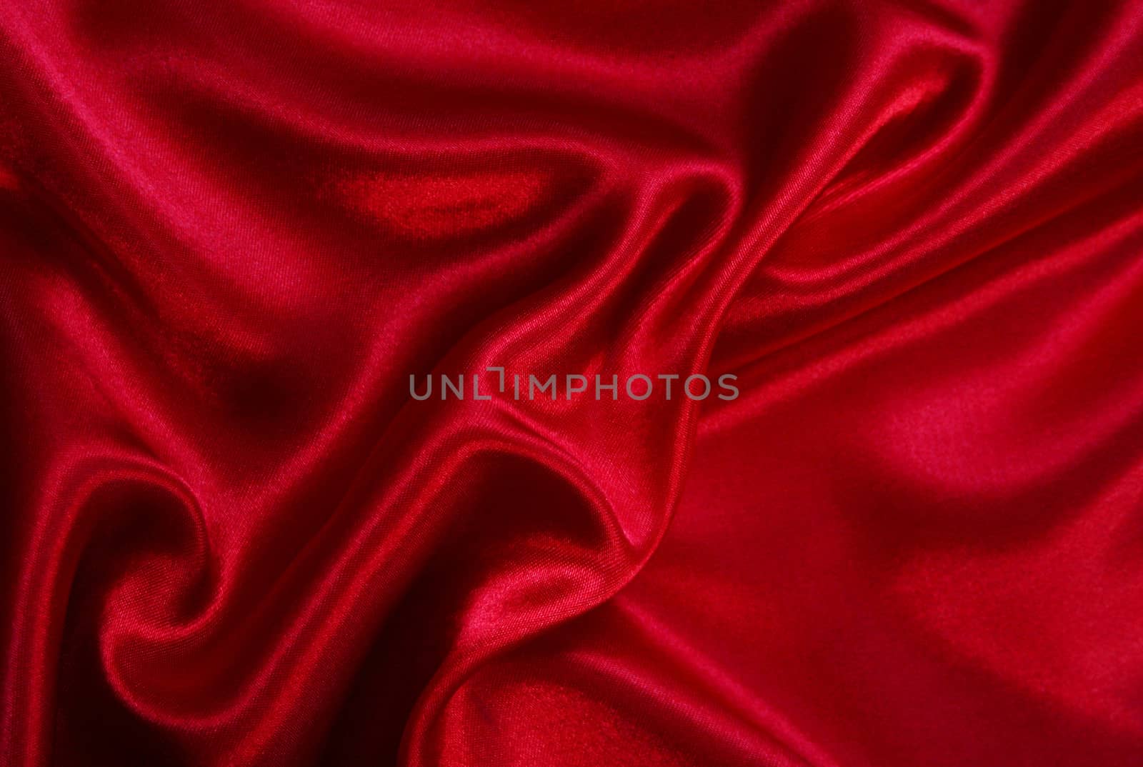 Smooth elegant red silk can use as background 