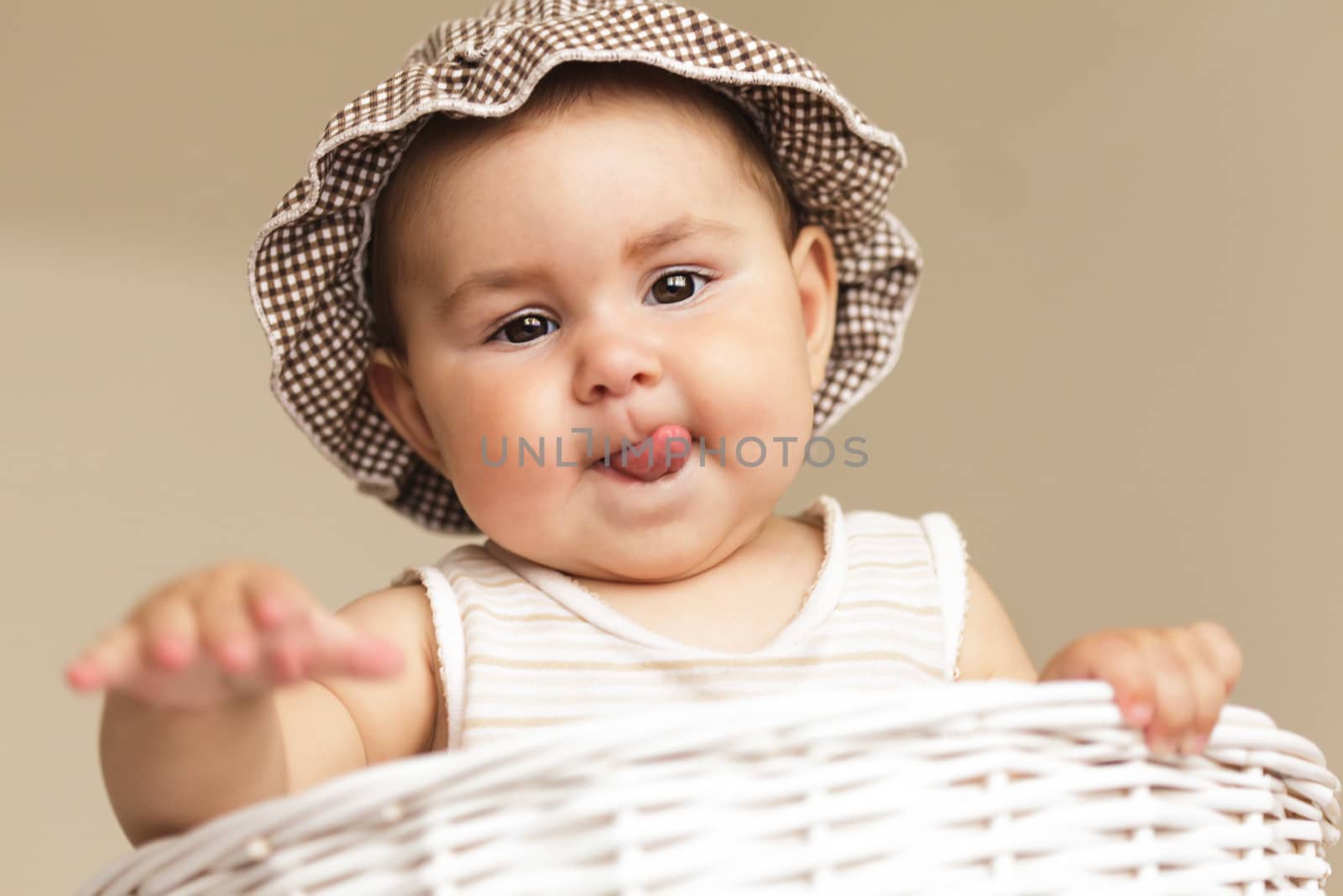 Eight month baby in basket by oksix