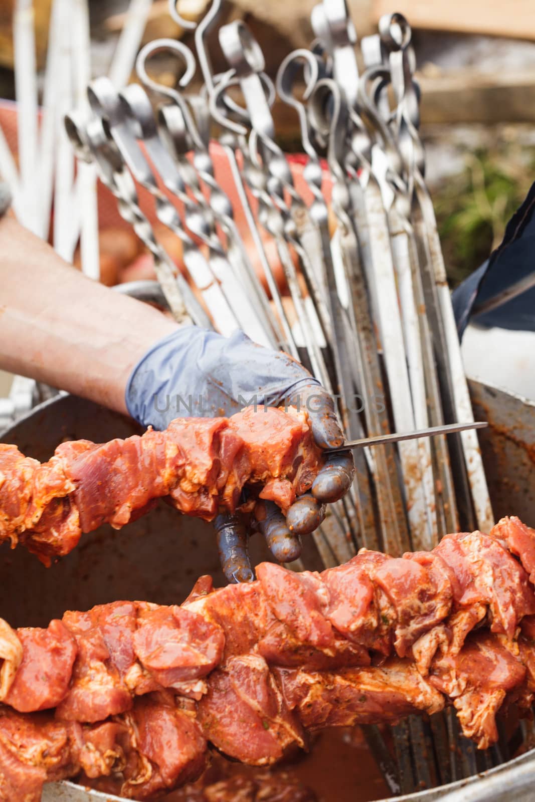 Shashlik on skewers closeup. Raw meat. Preparation for cooking