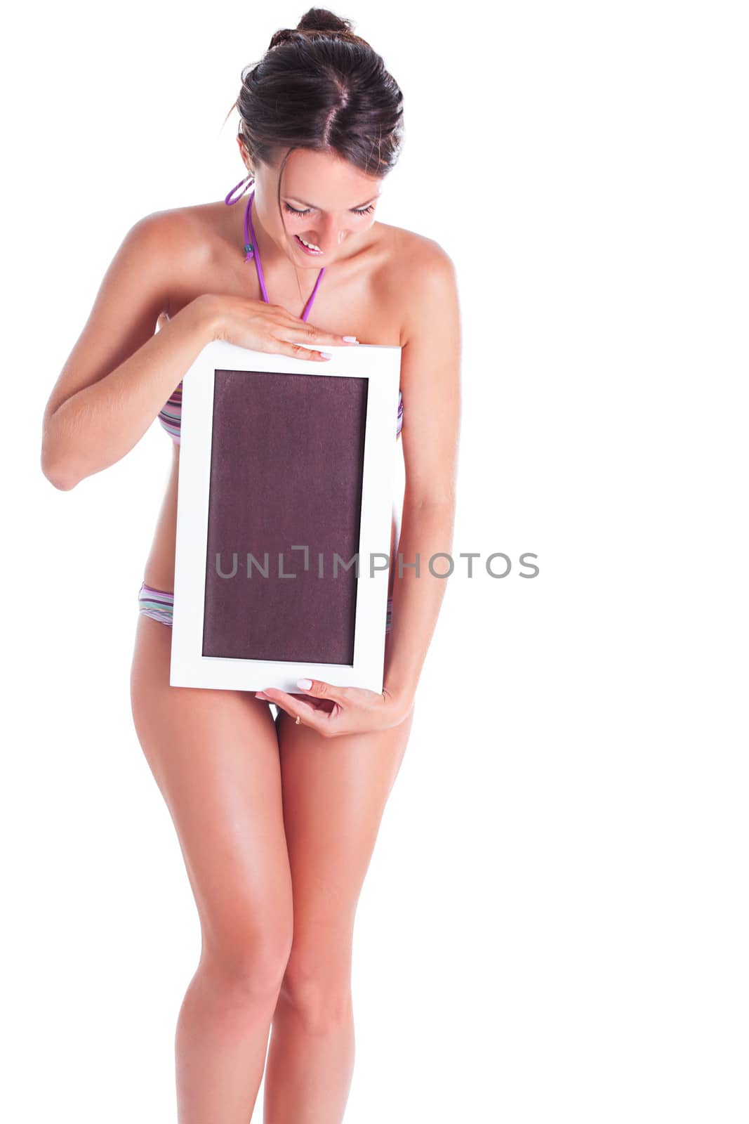 Young girl in swimsuit with empty board isolated. Focus on the board