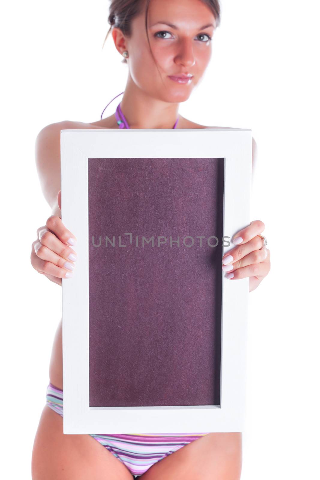 Young girl in swimsuit with empty board isolated