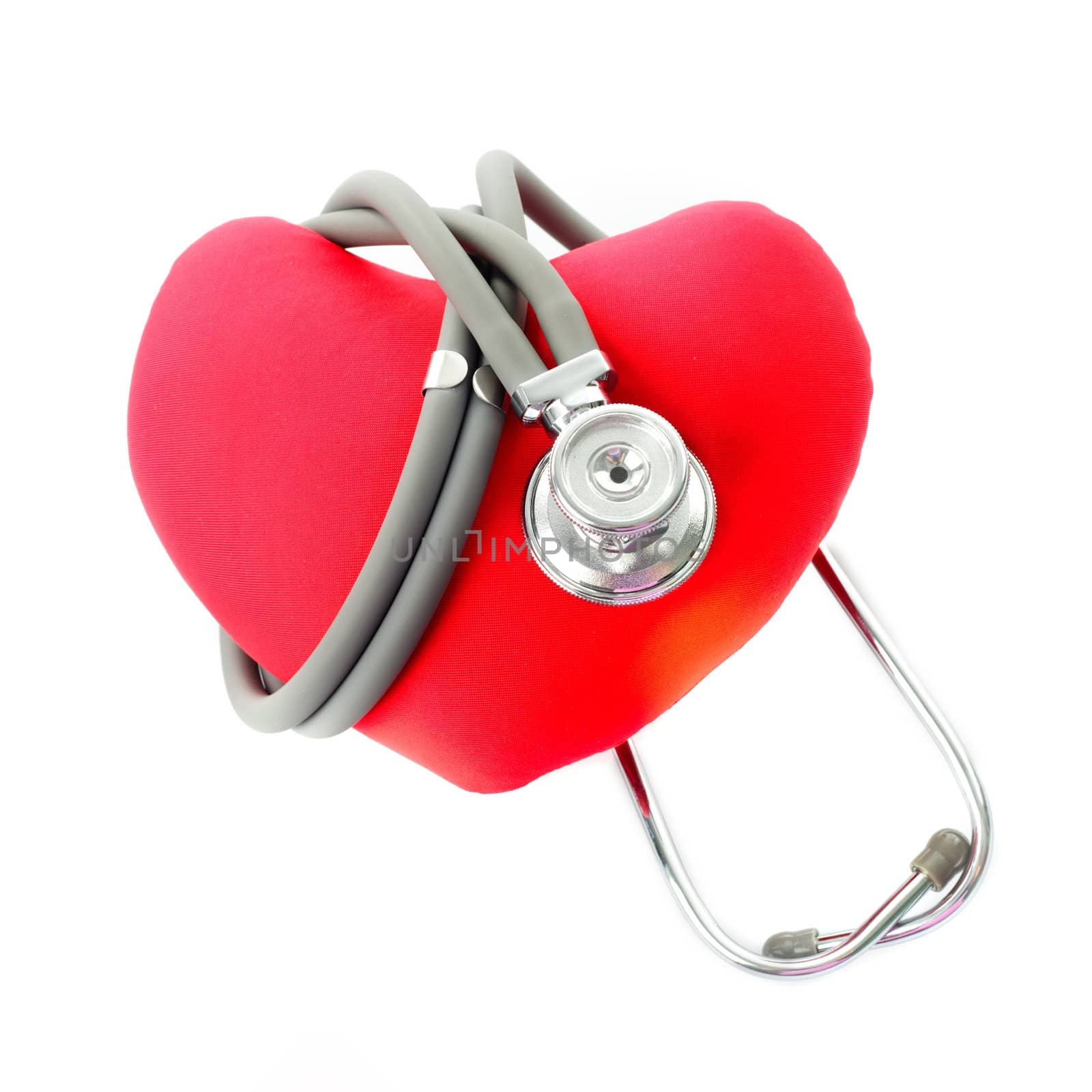 Medical stethoscope with red heart isolated on white