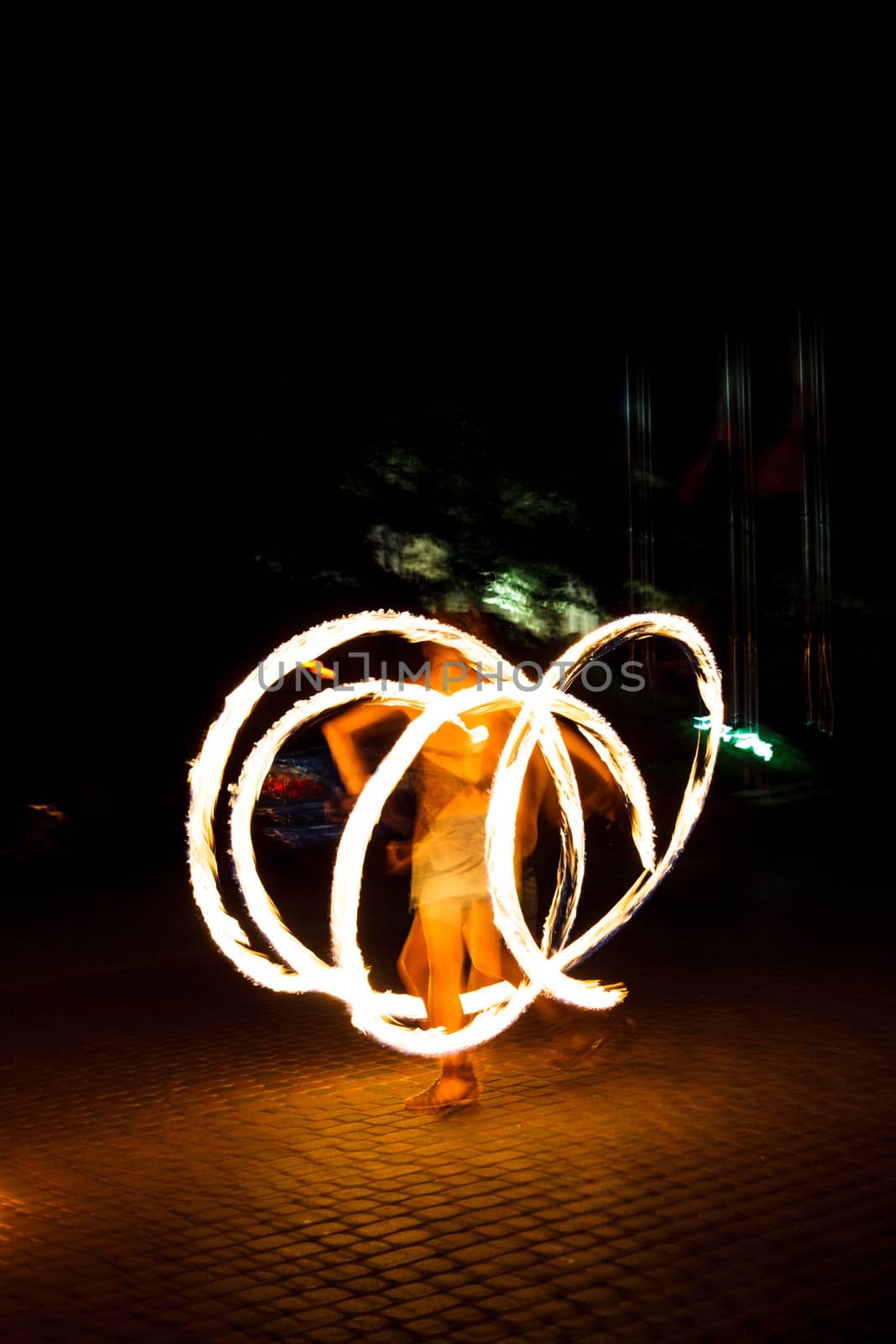 The girl dance with burning balls, fireshow