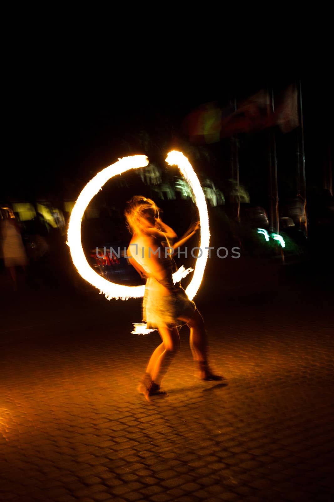 The girl dance with burning balls, fireshow