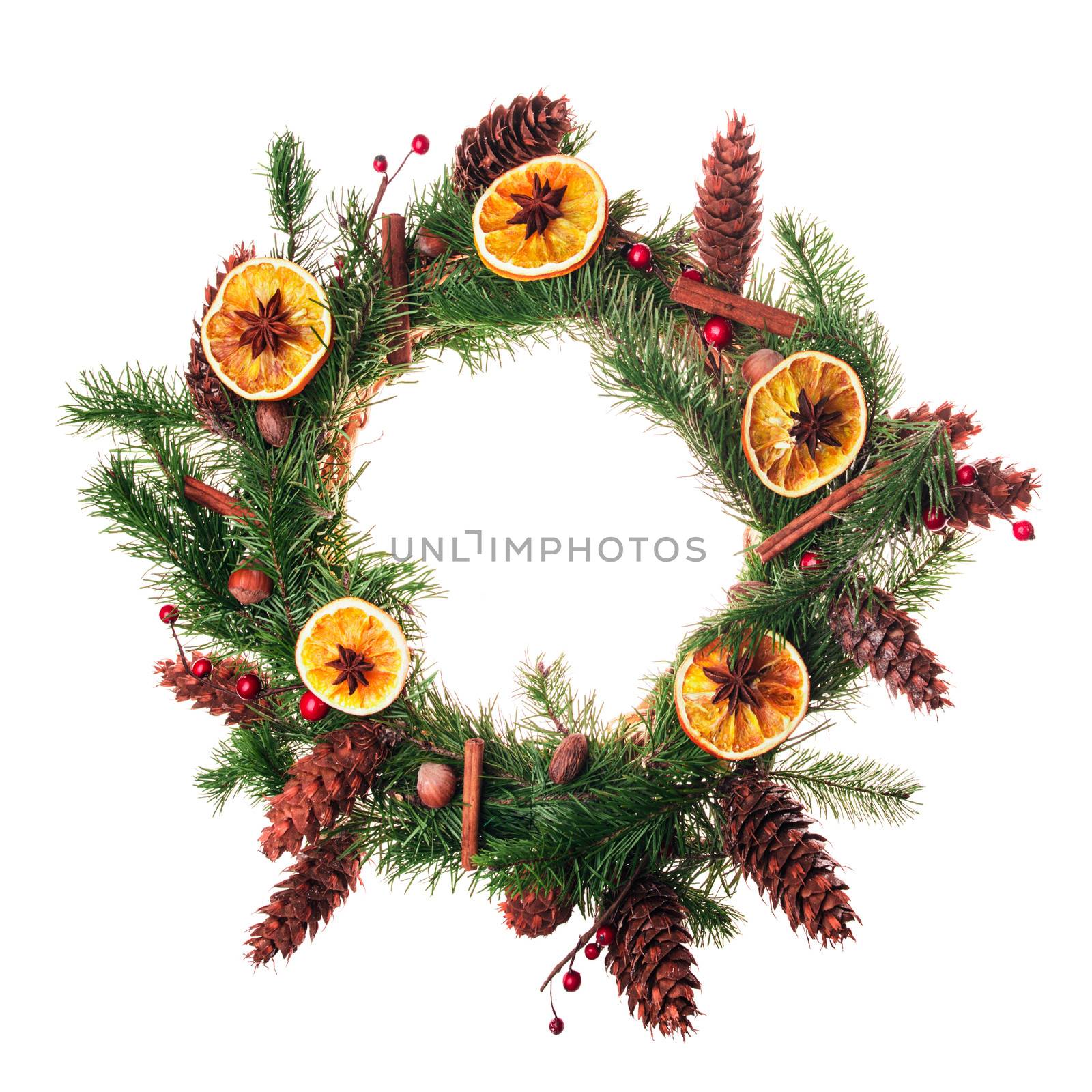 Christmas wreath with dry orange slices and cinnamon sticks