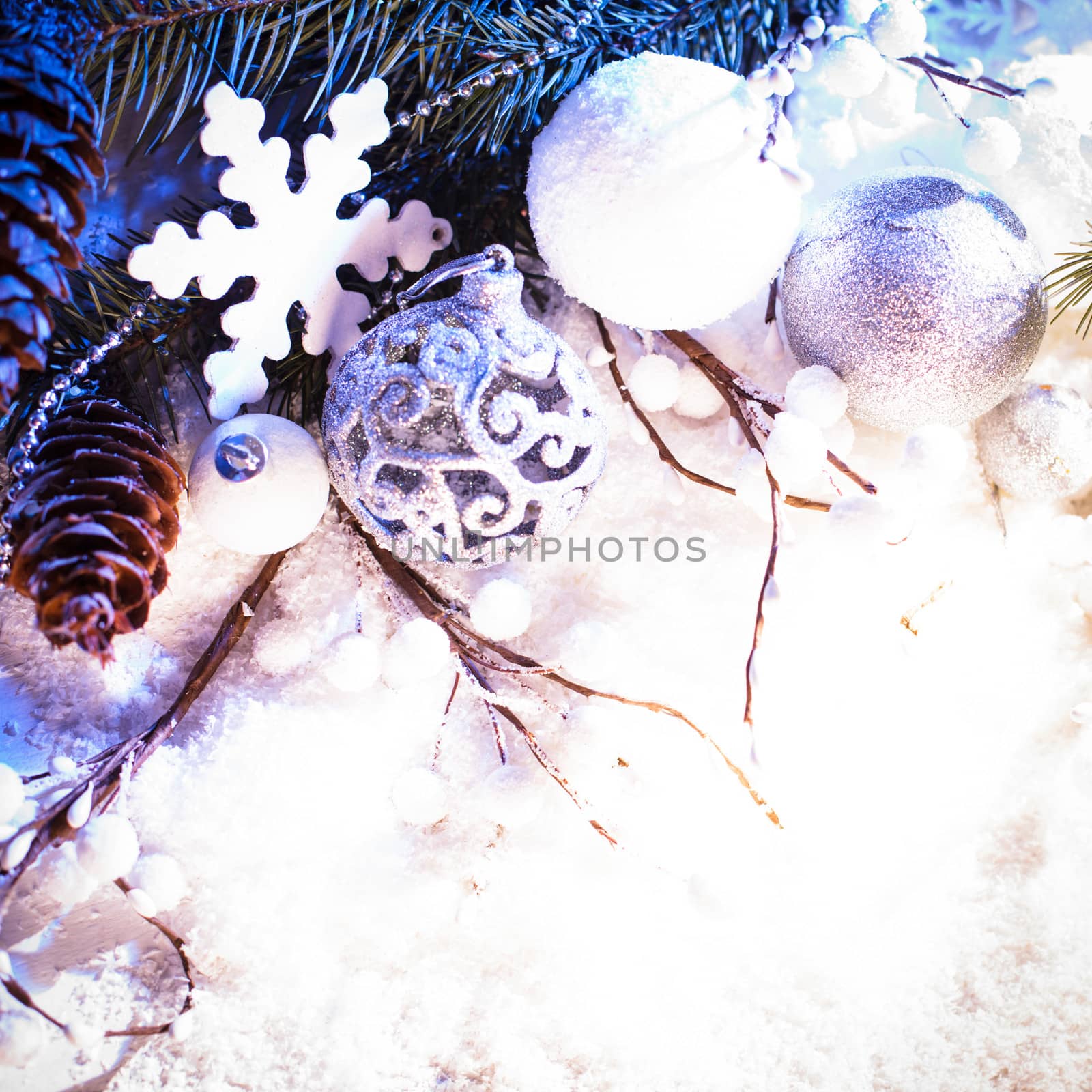 White and silver christmas decor with blue light