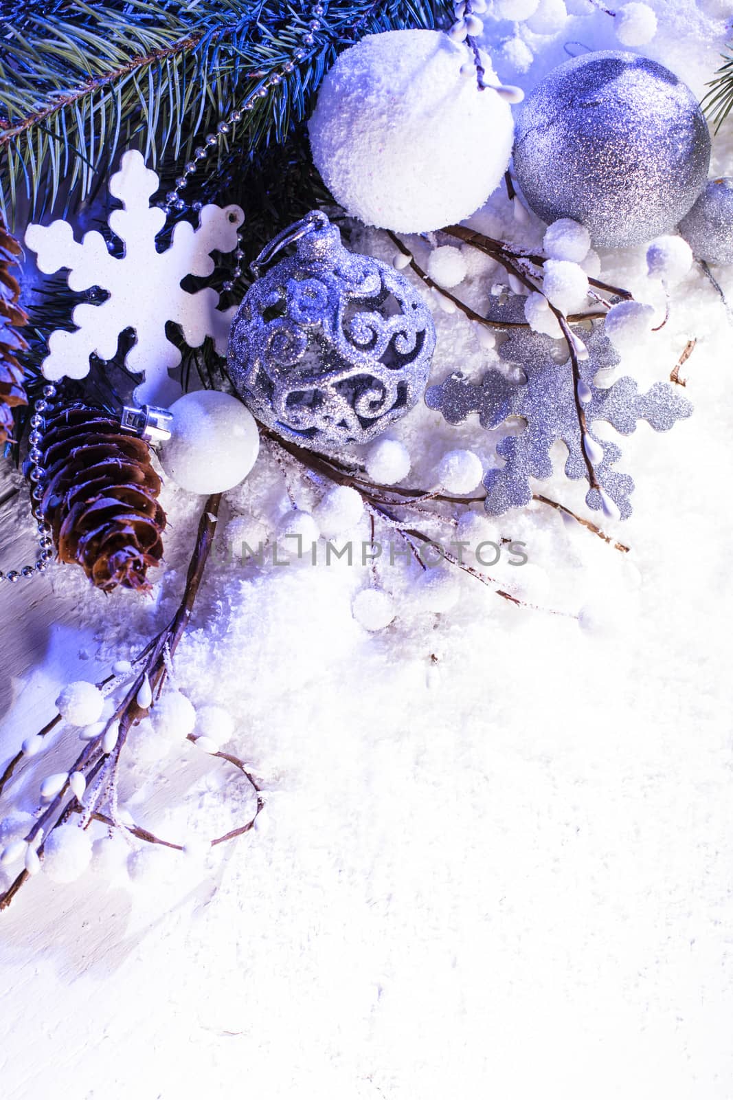 White and silver christmas decor with blue light