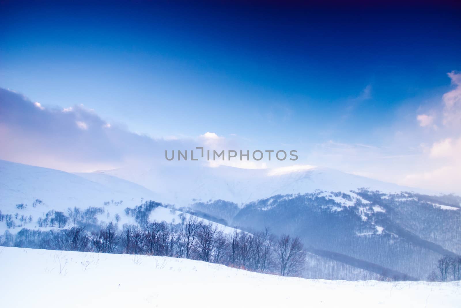 Winter snow mountain landscape before the storm