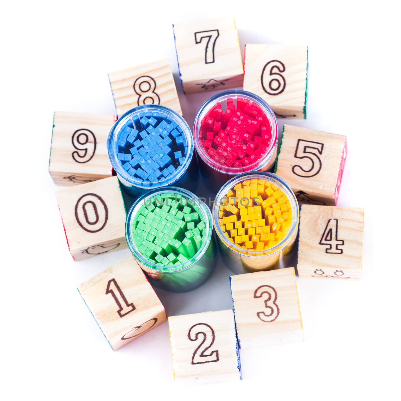 Various color counting sticks wooden cubes with digits isolated
