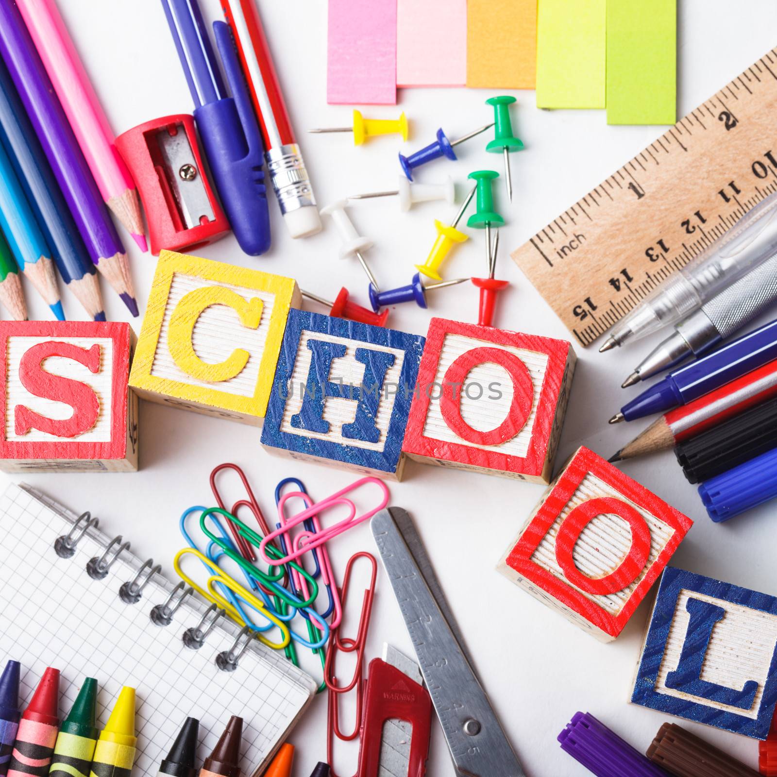 Primary school stationery on a white background