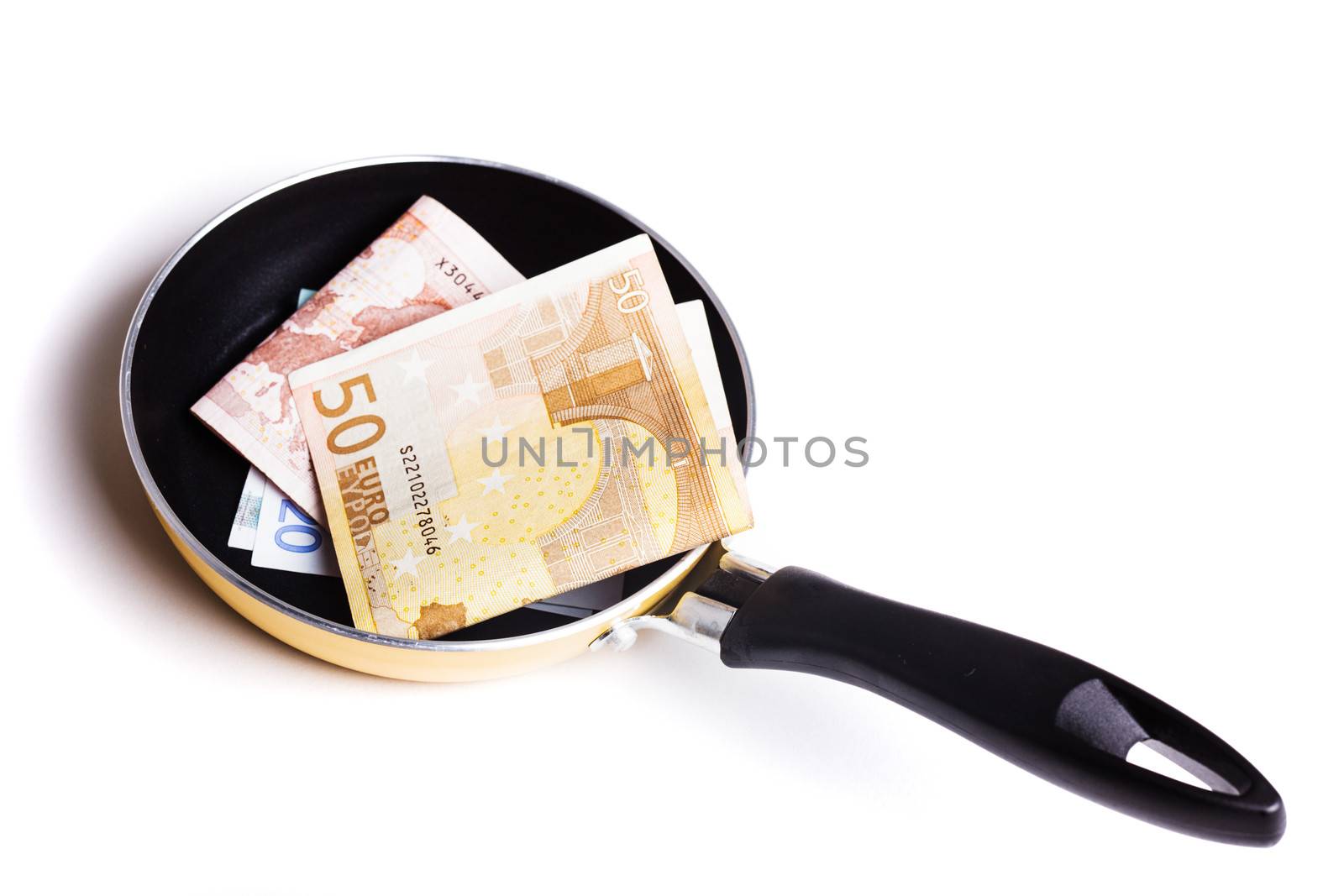 make money concept - preparation of euro on pan