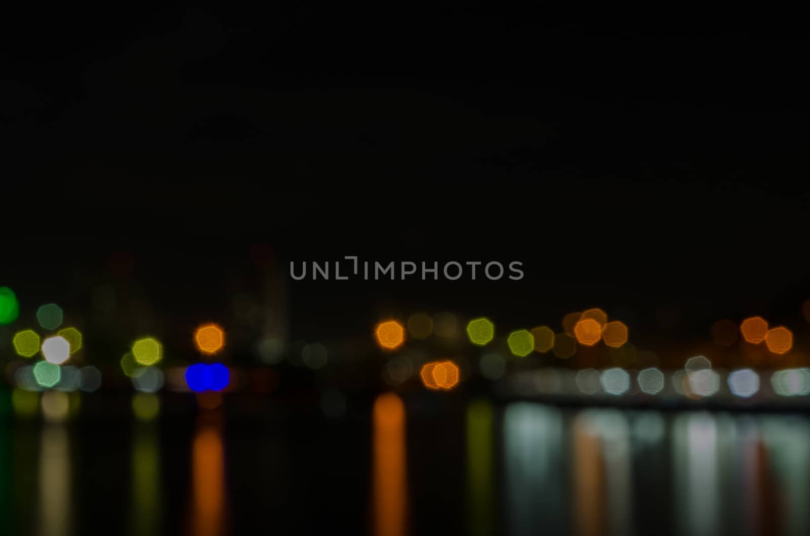 Abstract pattern of the night city in defocused lights