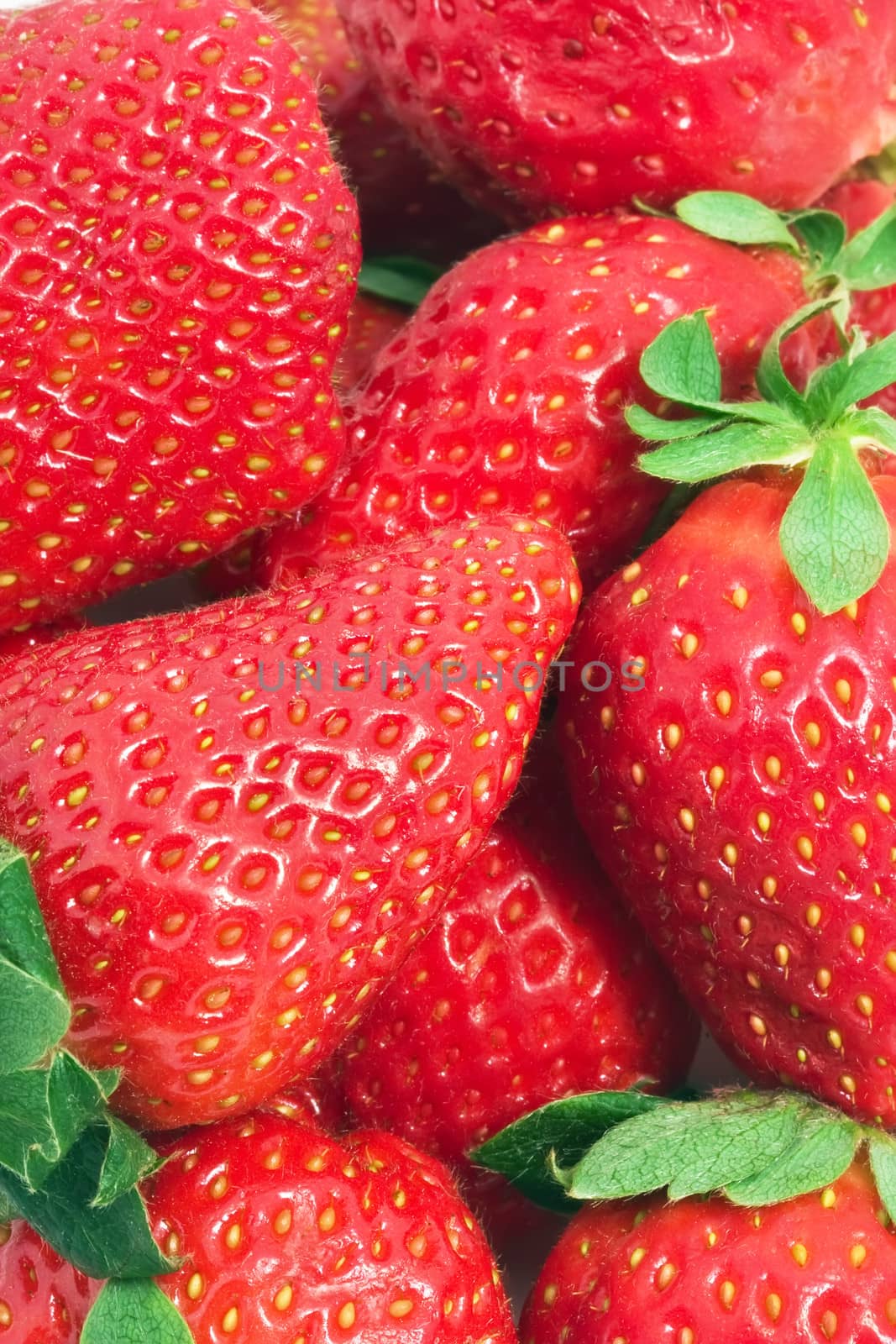 Red sweet strawberries making nice edible background