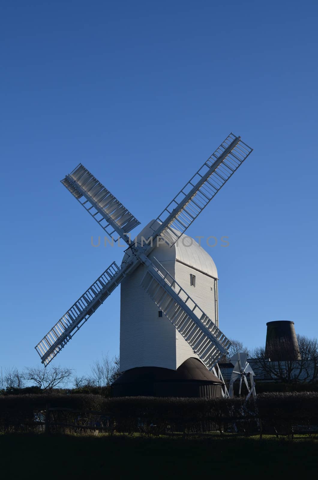 Old Sussex windmill built in 1821 and now fully restored is a famous landmark on Clayton Hill, Sussex, England. Known as Jill mill.