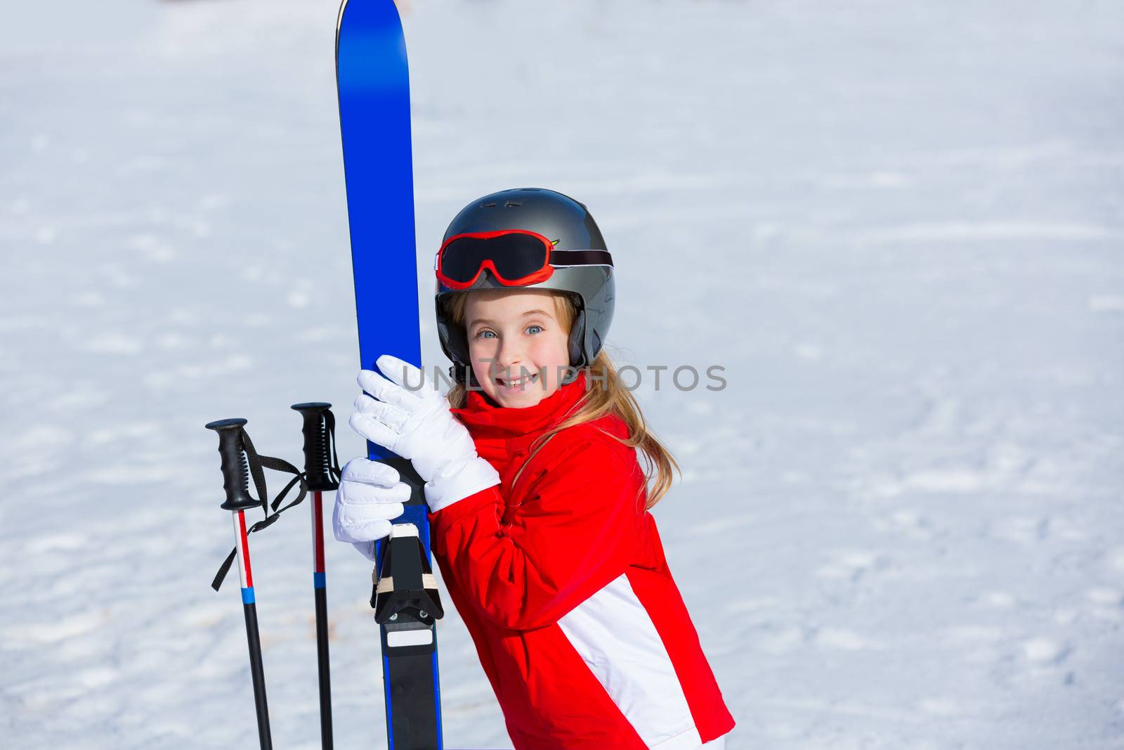 Kid girl winter snow with ski equipment helmet goggles poles