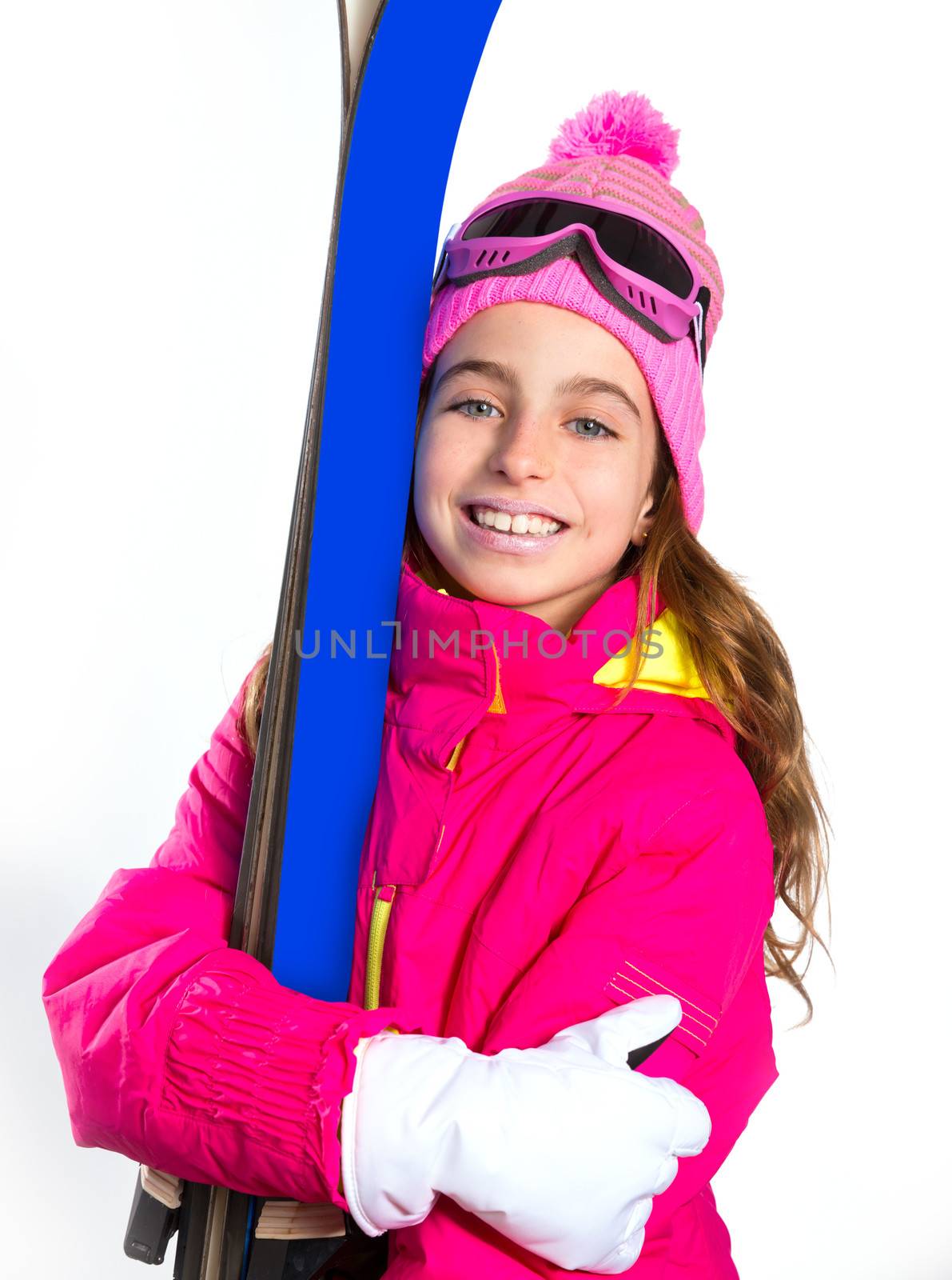 Kid girl ski with snow equipment goggles and winter wool hat