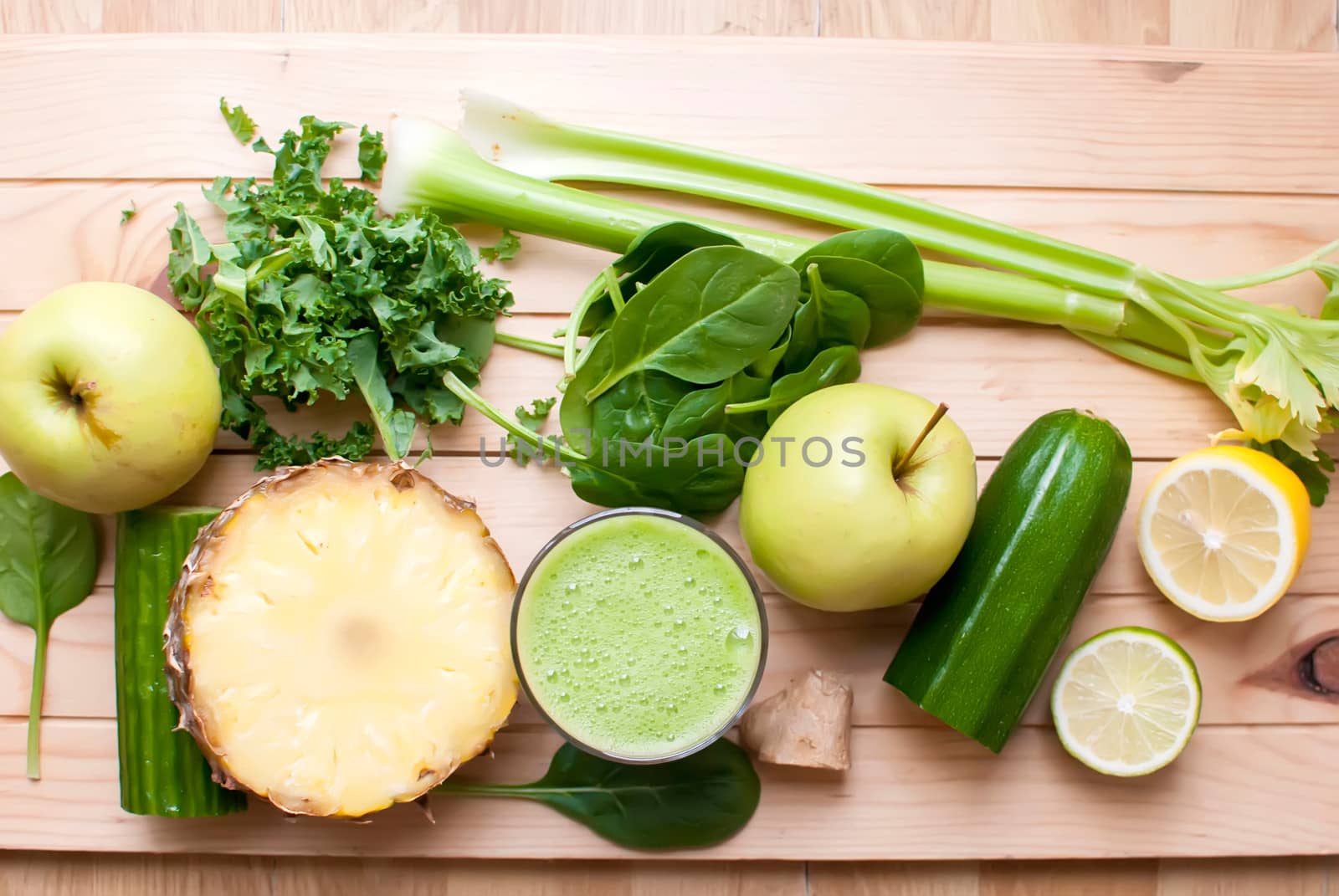 healthy organic green detox juice on wood