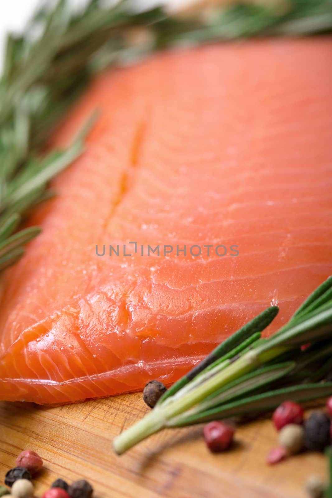 Piece fresh salmon with spices by Discovod