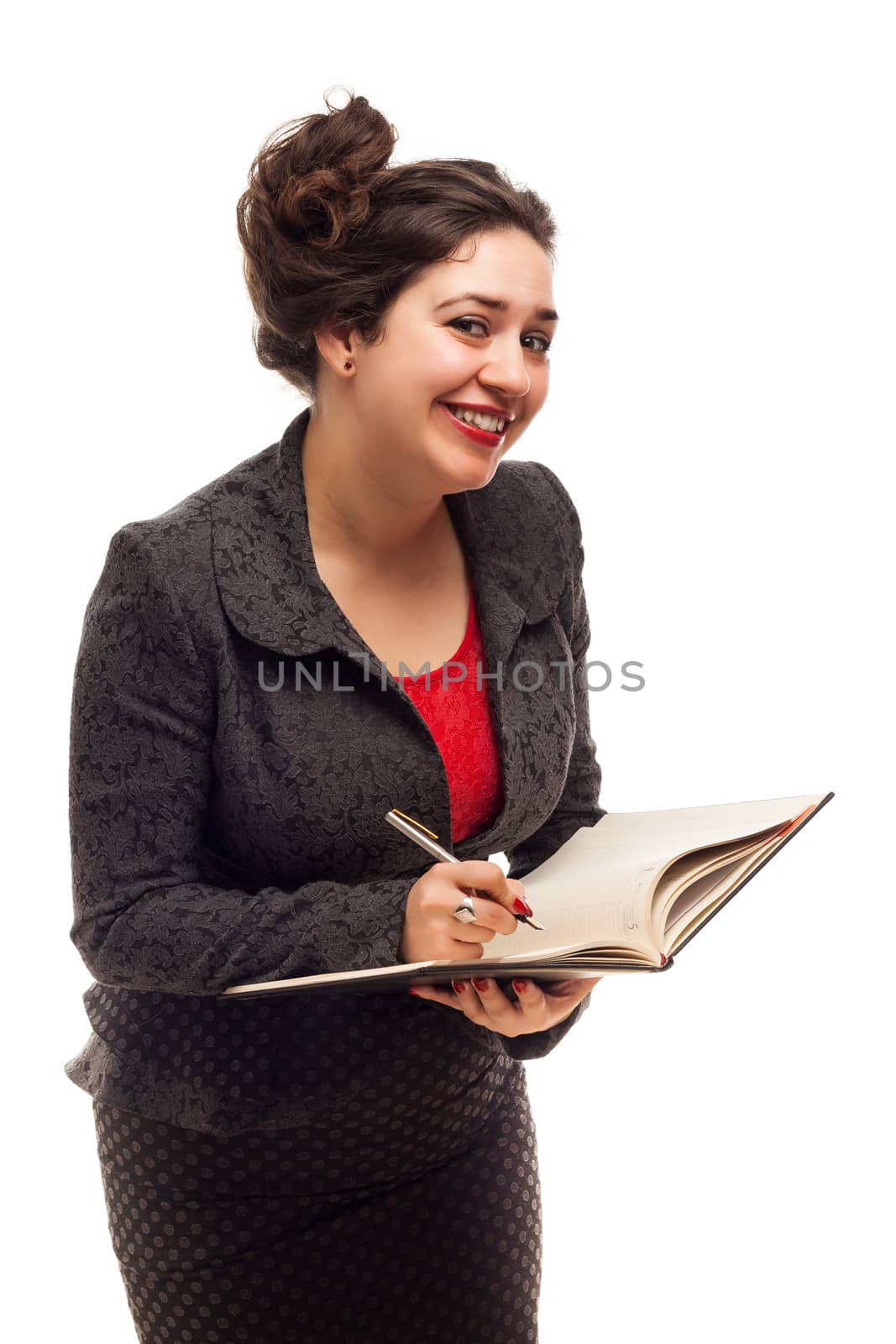 Confident business woman portrait  with notebook isolated over a white background